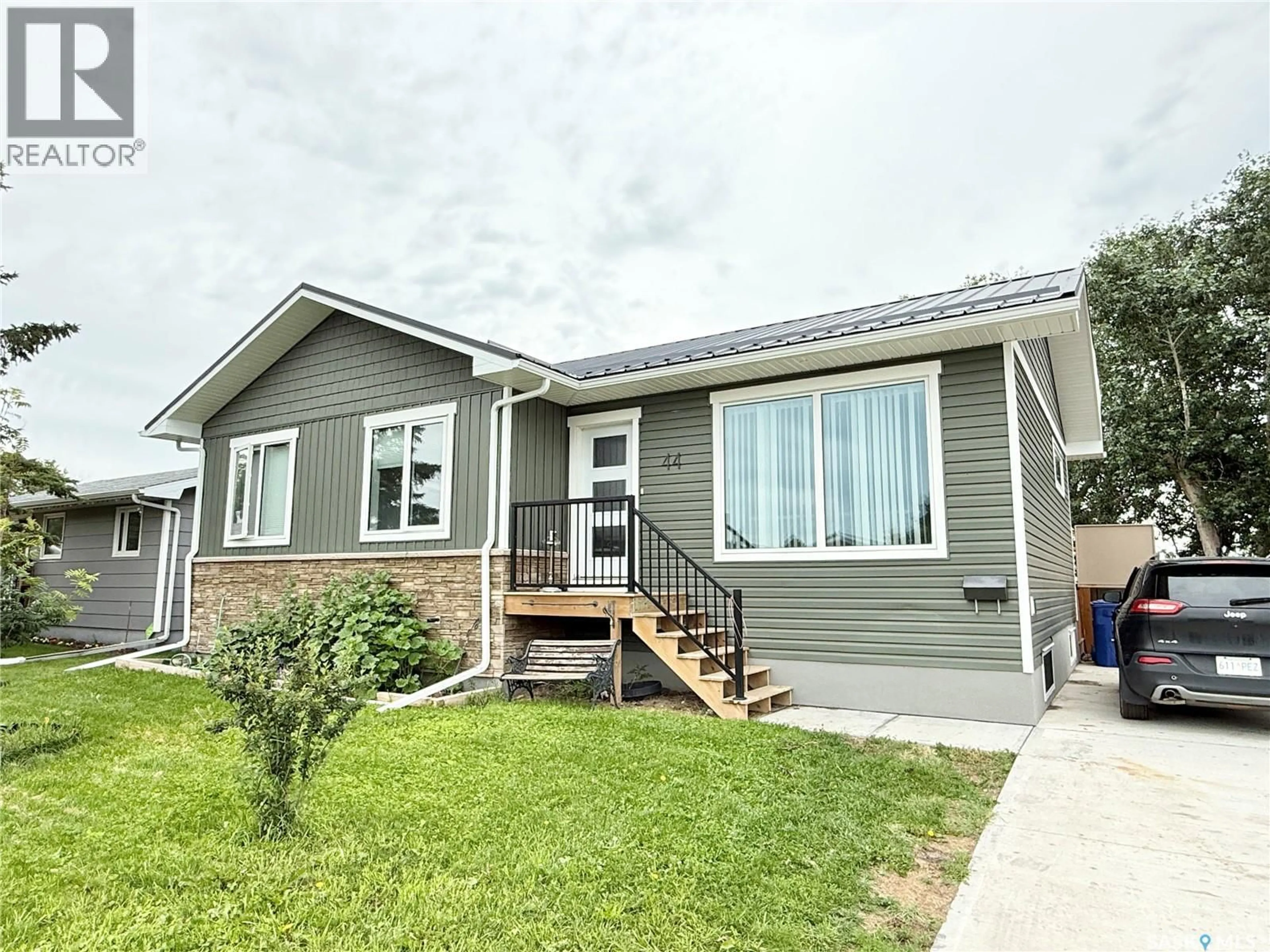 Home with vinyl exterior material, street for 44 MITCHELL CRESCENT, Weyburn Saskatchewan S4H2M4