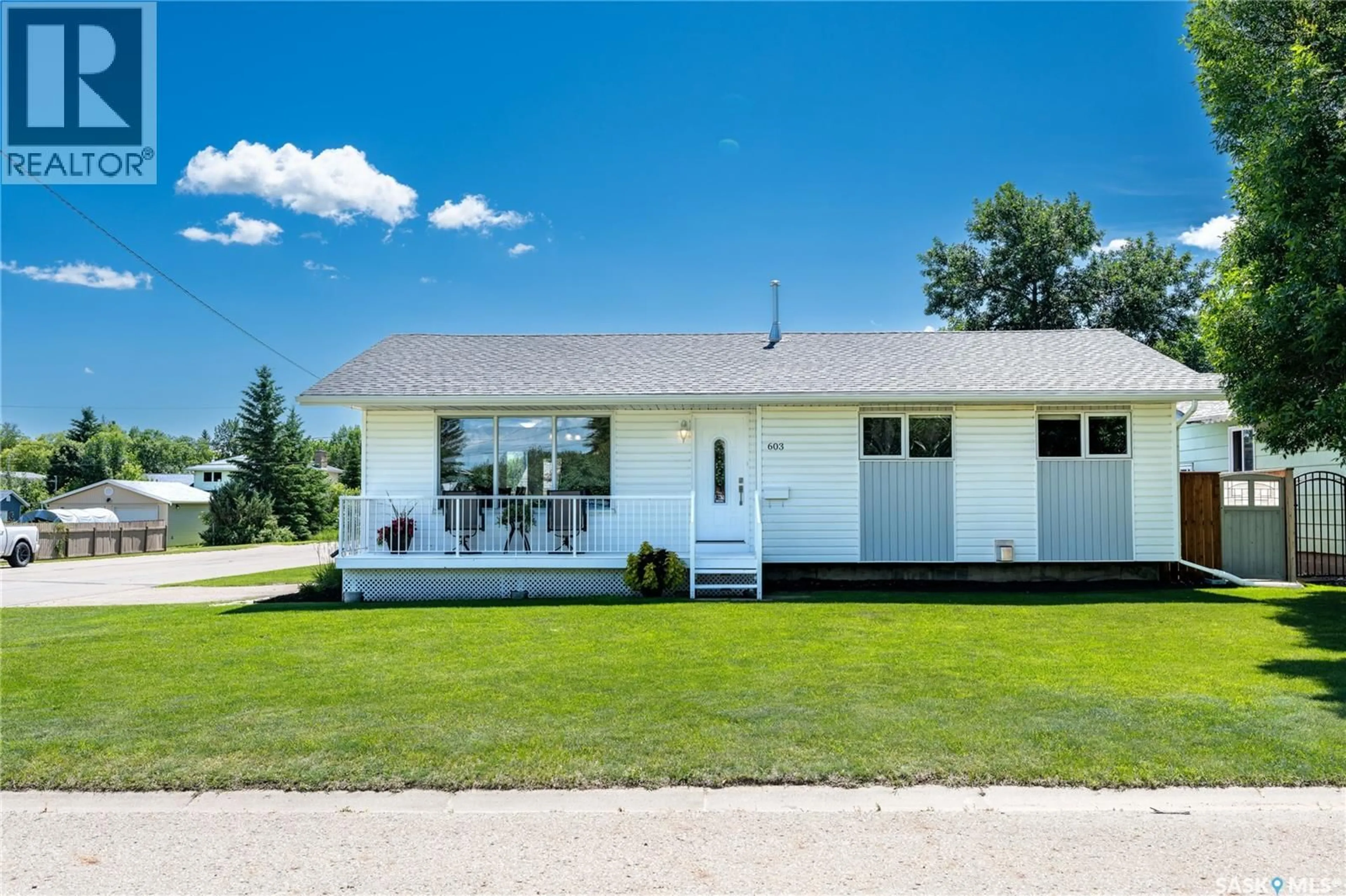 Home with vinyl exterior material, street for 603 CLOVER AVENUE, Dalmeny Saskatchewan S0K1E0