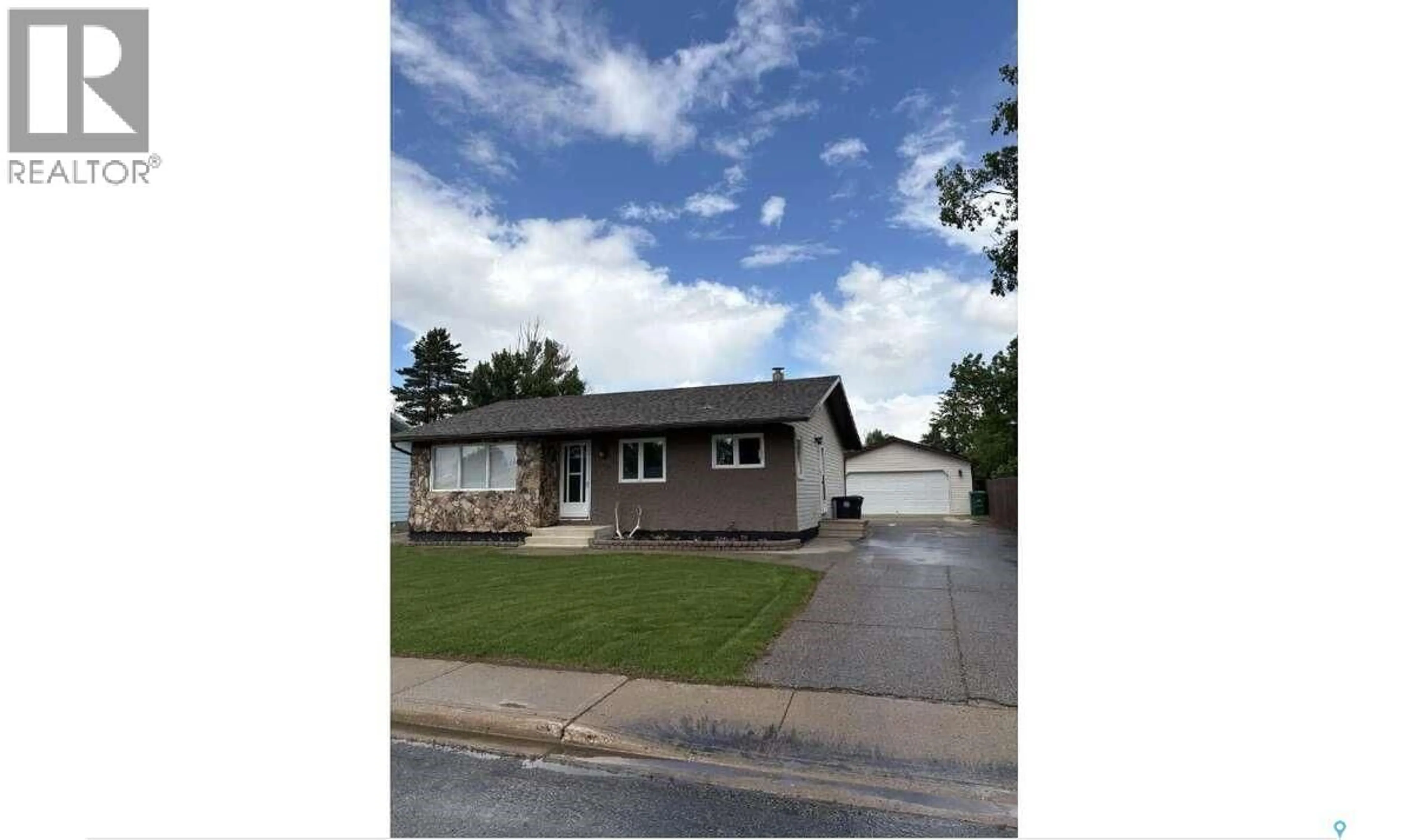 Home with vinyl exterior material, street for 405 7TH AVENUE, Biggar Saskatchewan S0K0M0