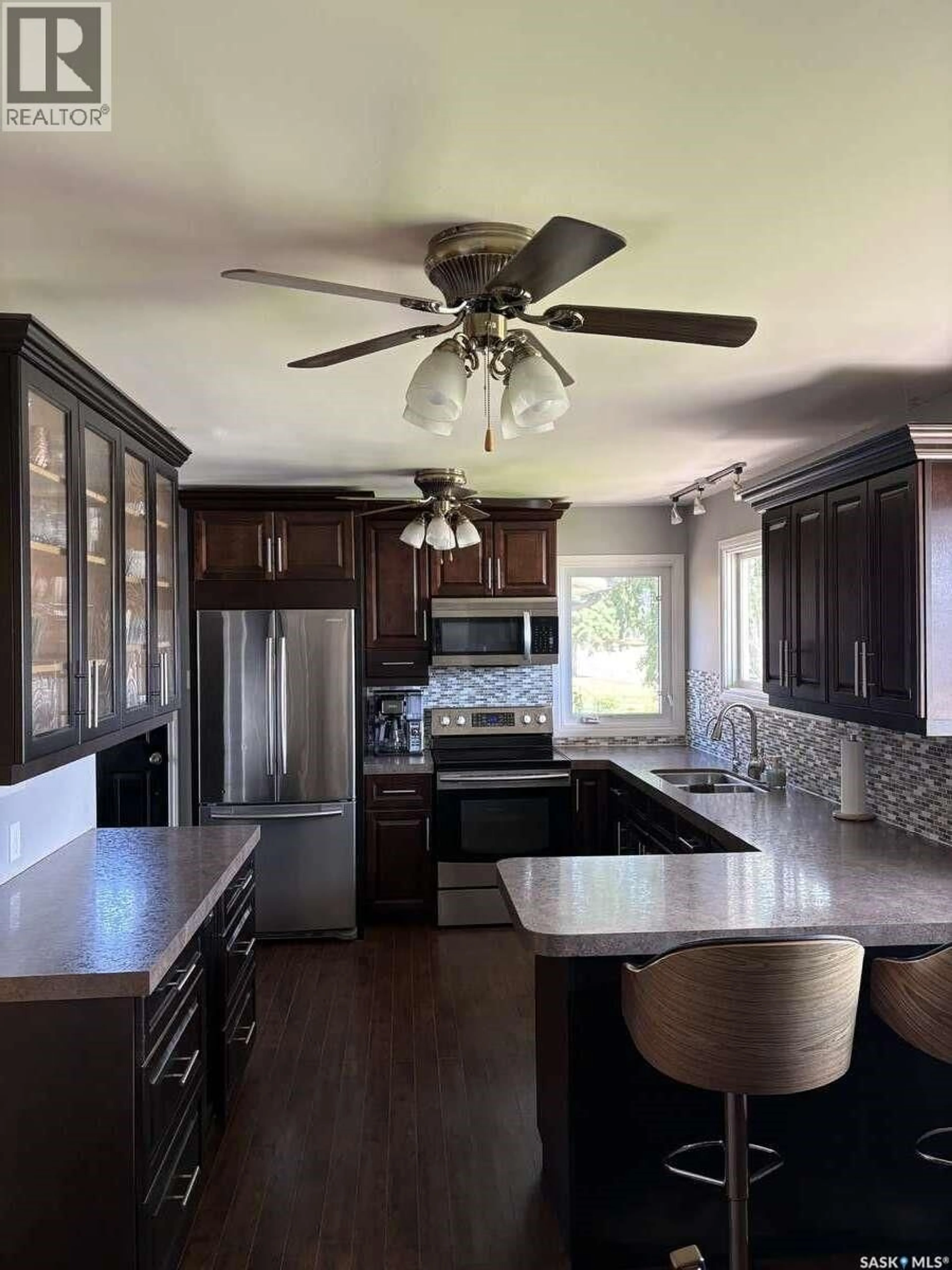 Open concept kitchen, unknown for 405 7TH AVENUE, Biggar Saskatchewan S0K0M0