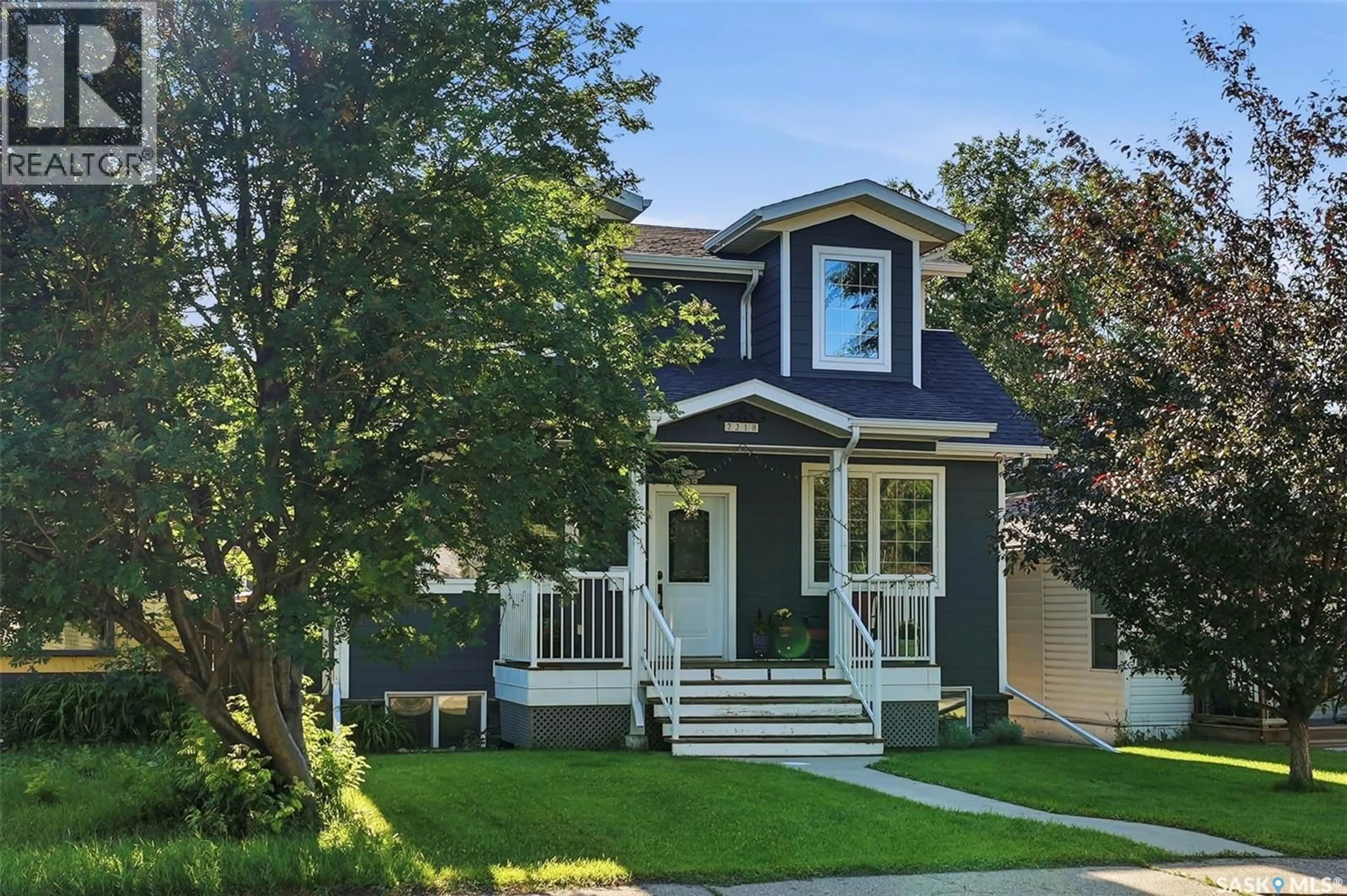 Home with vinyl exterior material, street for 2218 ST ANDREWS AVENUE, Saskatoon Saskatchewan S7M0M3