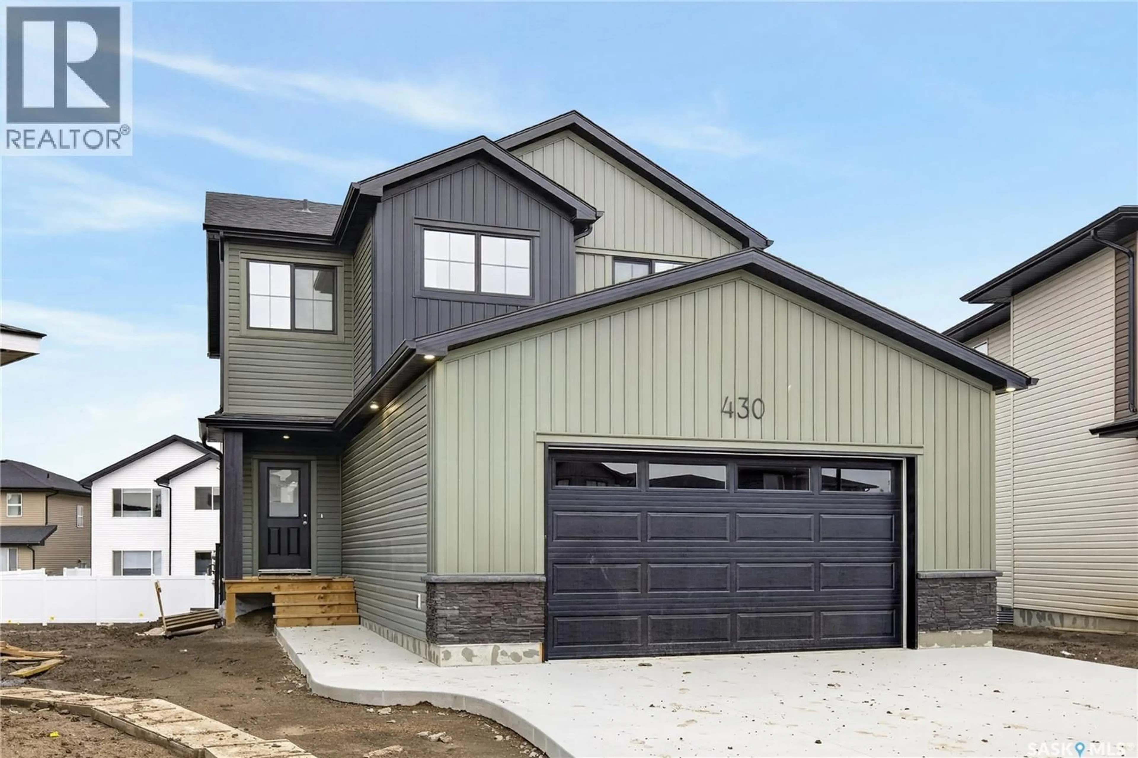 Home with vinyl exterior material, street for 430 COCKCROFT PLACE, Saskatoon Saskatchewan S7V1Y9