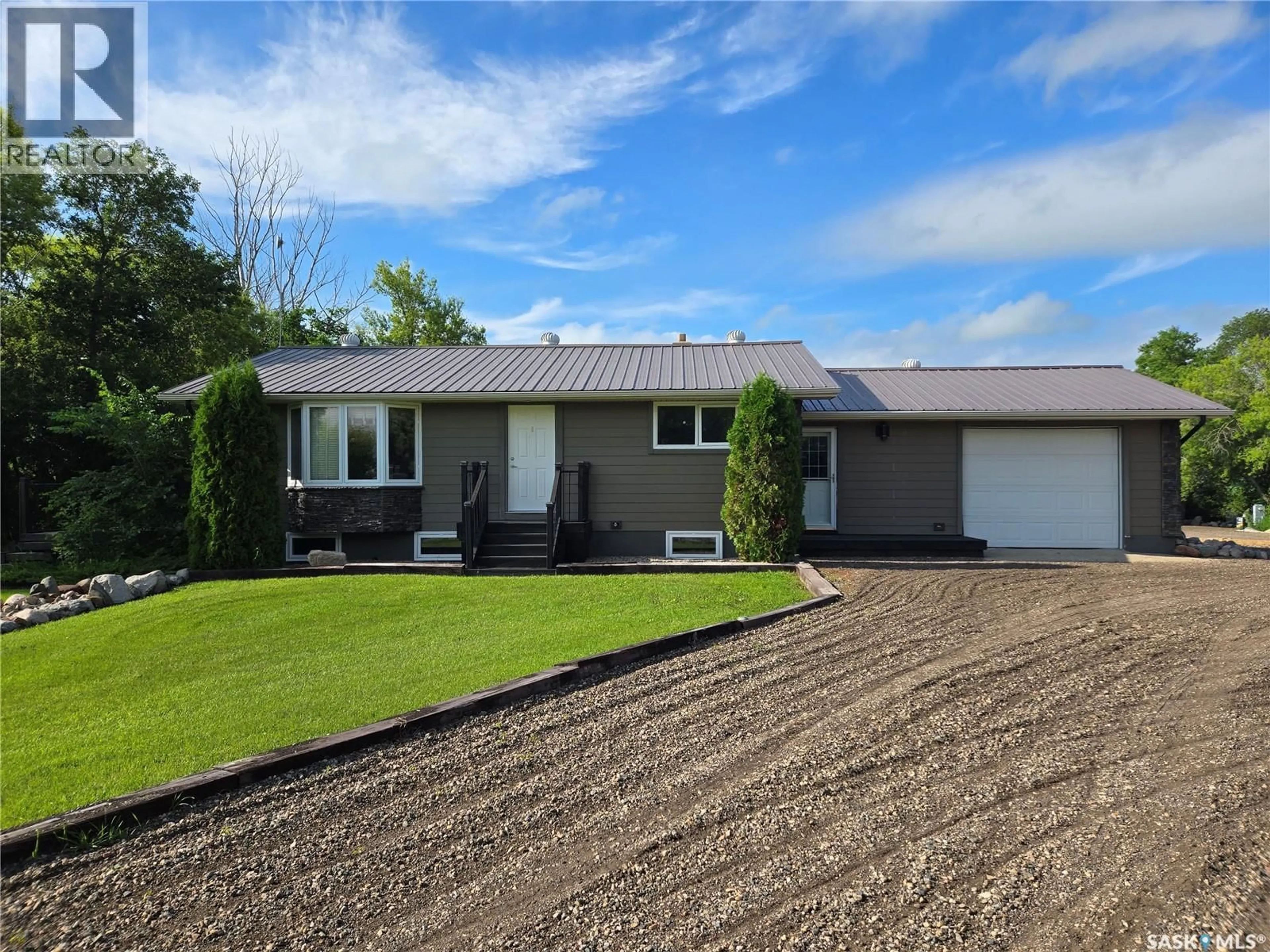 Home with vinyl exterior material, street for KOZMECH ACREAGE, Wallace Rm No. 243 Saskatchewan S3N2W7