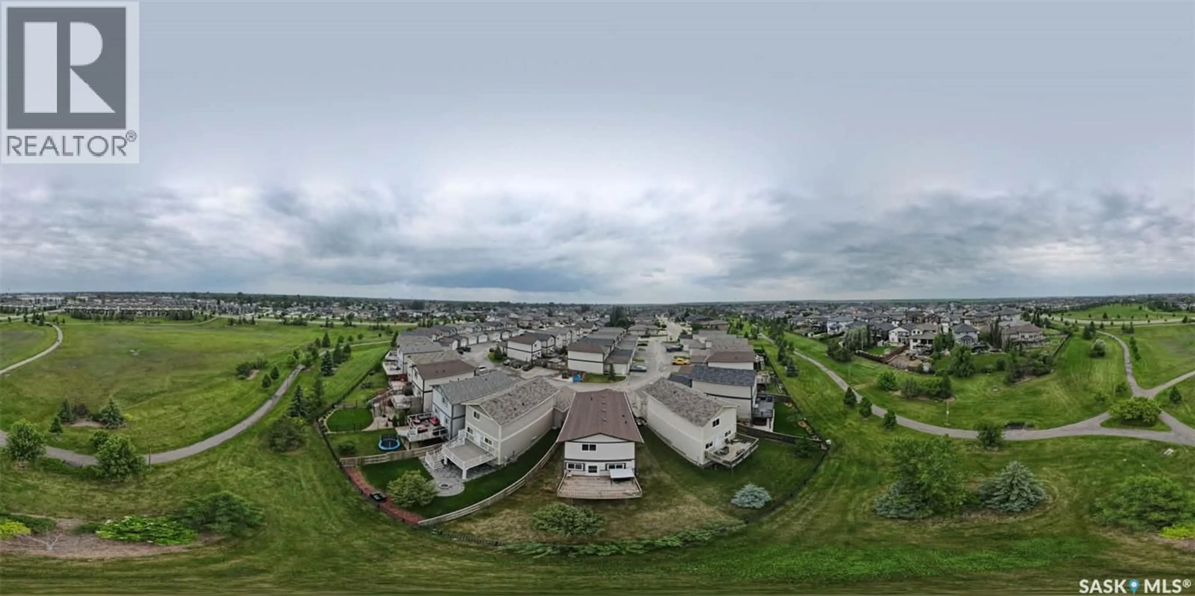 A pic from outside/outdoor area/front of a property/back of a property/a pic from drone, unknown for 202 - 16 MCKAGUE CRESCENT, Saskatoon Saskatchewan S7R0L8