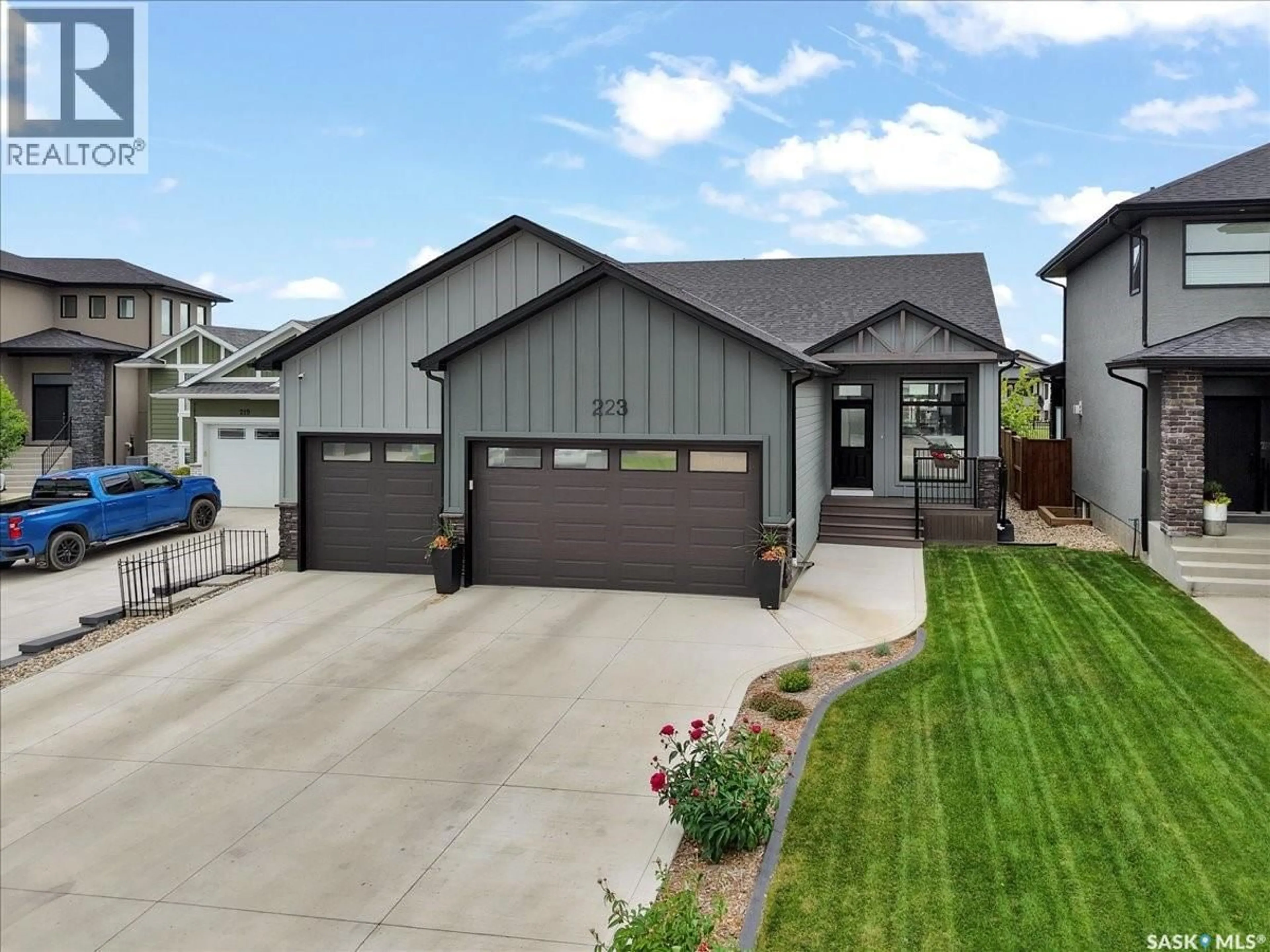 Home with vinyl exterior material, street for 223 HAMM CRESCENT, Saskatoon Saskatchewan S7V0R9