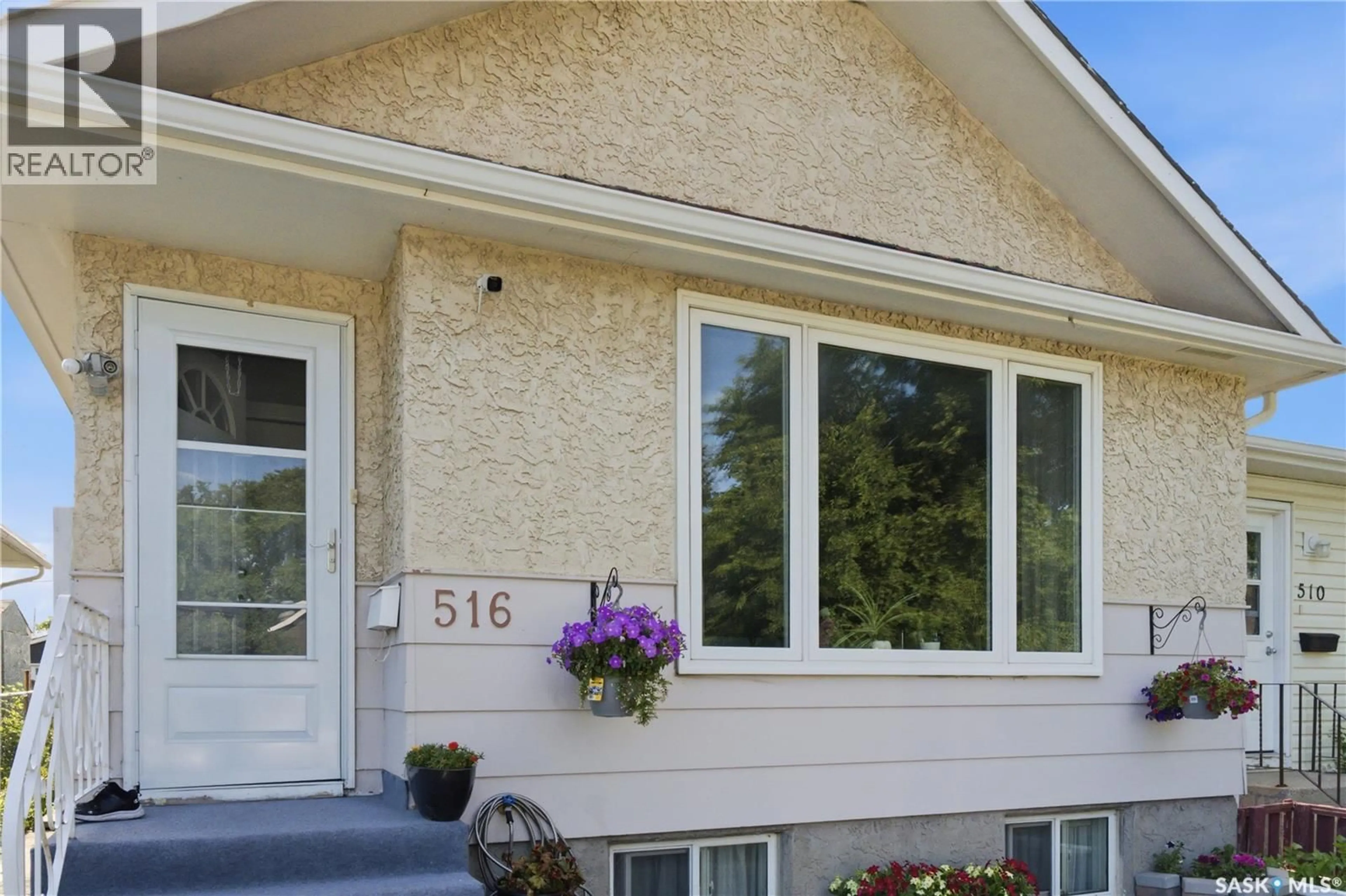 Home with vinyl exterior material, street for 516 HAMILTON STREET, Regina Saskatchewan S4R2A9