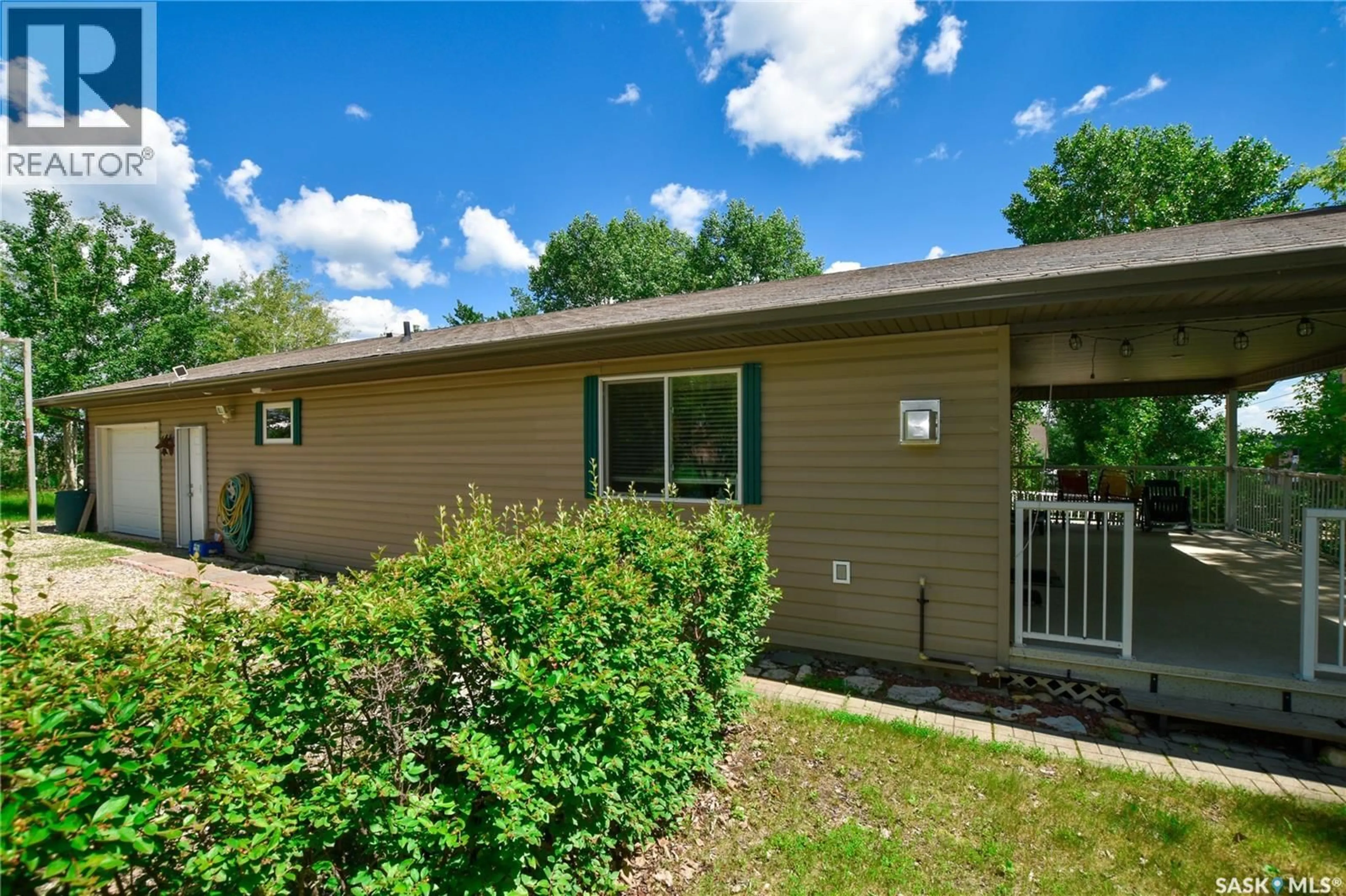 Home with vinyl exterior material, street for 134 SUNRIDGE ROAD, Pebble Baye Saskatchewan S0J2G0