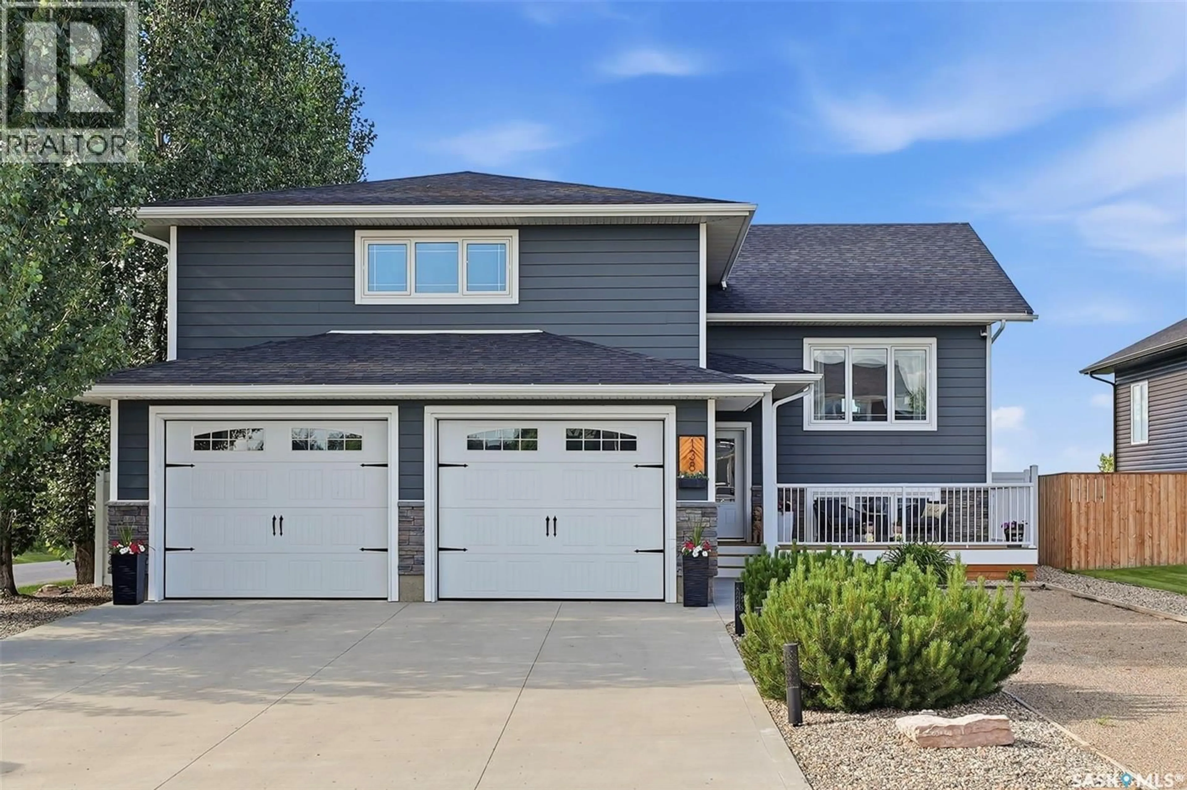 Home with vinyl exterior material, street for 138 OLAUSON CRESCENT, Vanscoy Saskatchewan S0L3J0