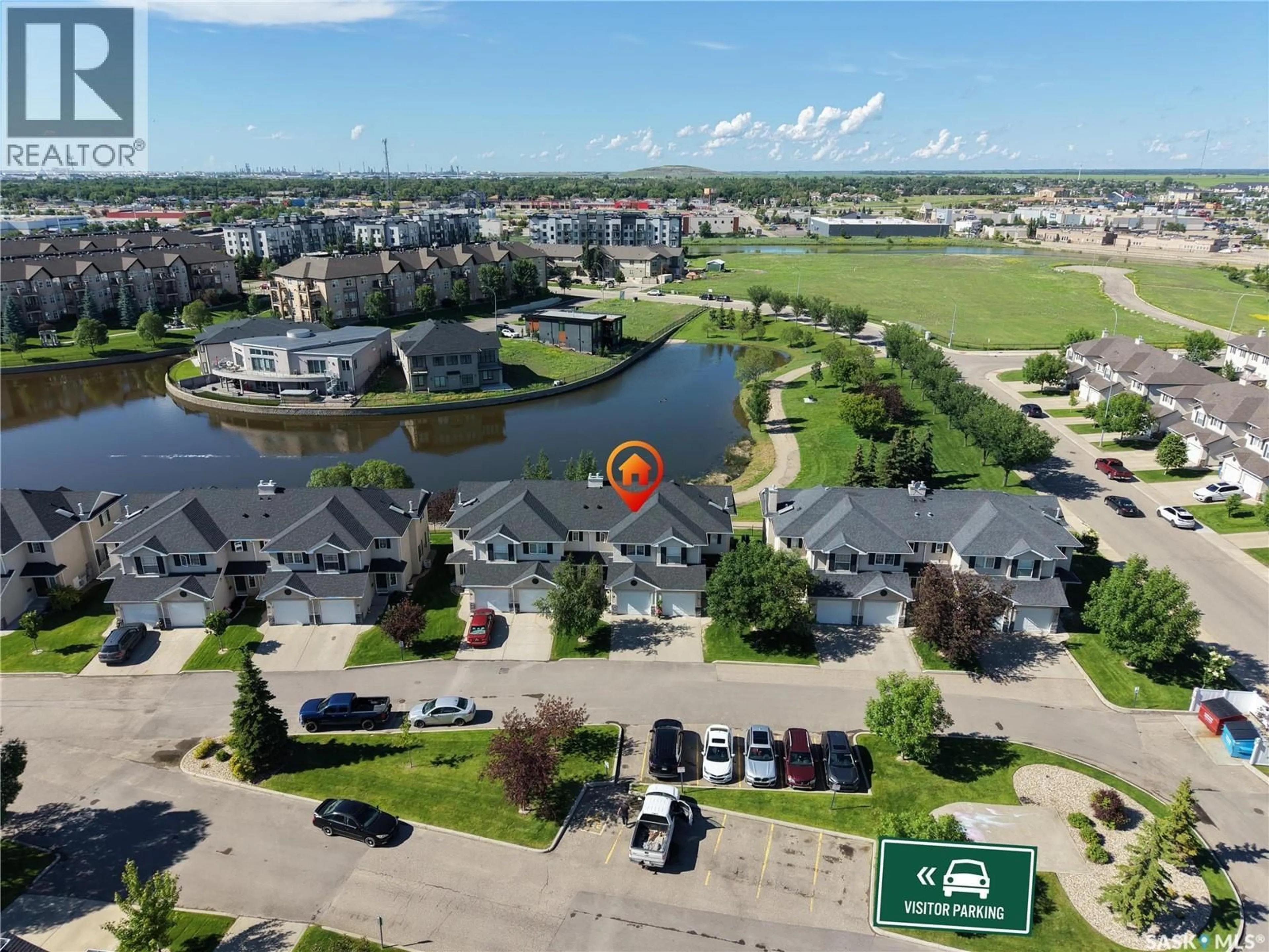 A pic from outside/outdoor area/front of a property/back of a property/a pic from drone, unknown for 30 2400 TELL PLACE, Regina Saskatchewan S4V3E3