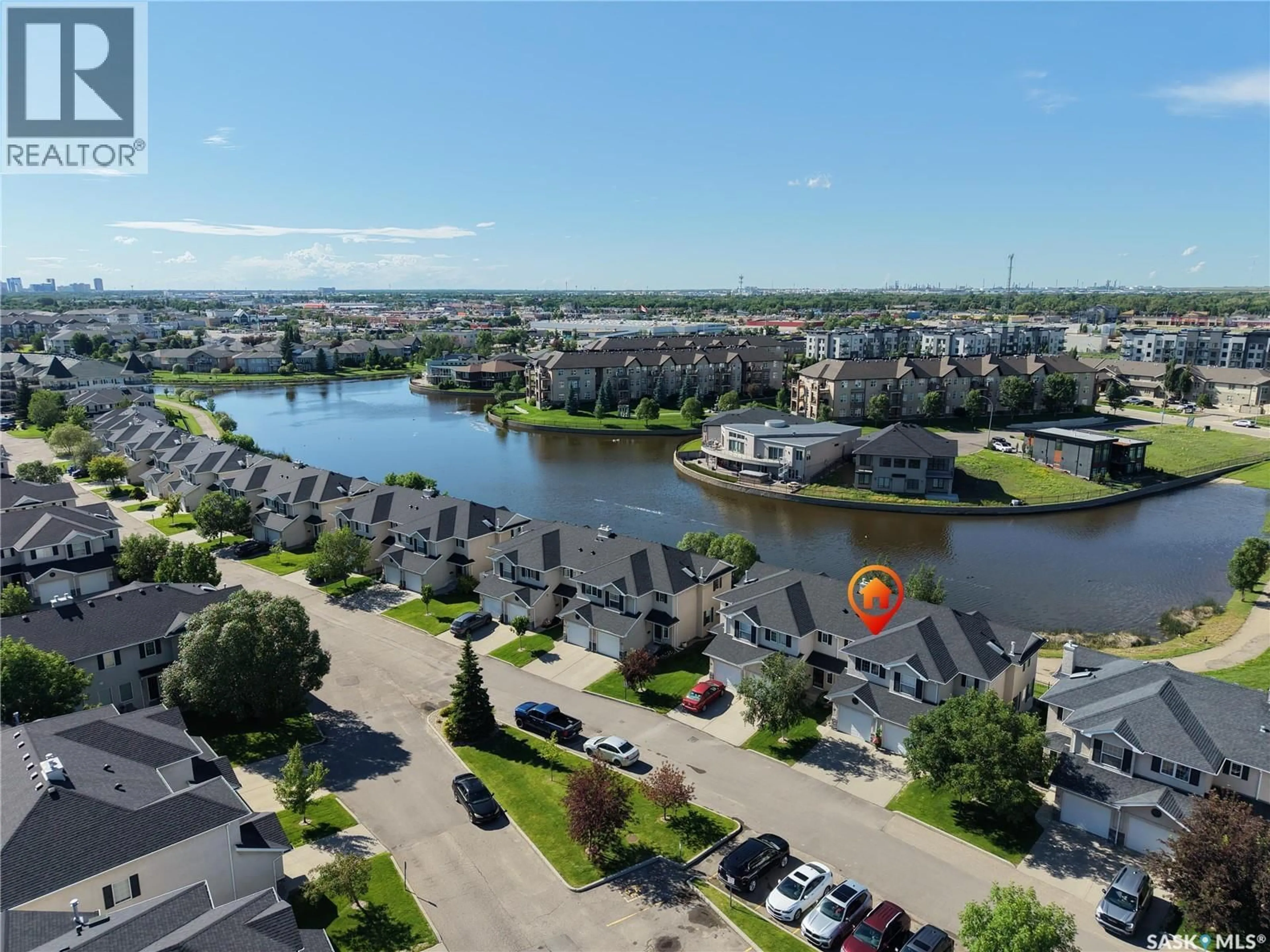 A pic from outside/outdoor area/front of a property/back of a property/a pic from drone, water/lake/river/ocean view for 30 2400 TELL PLACE, Regina Saskatchewan S4V3E3