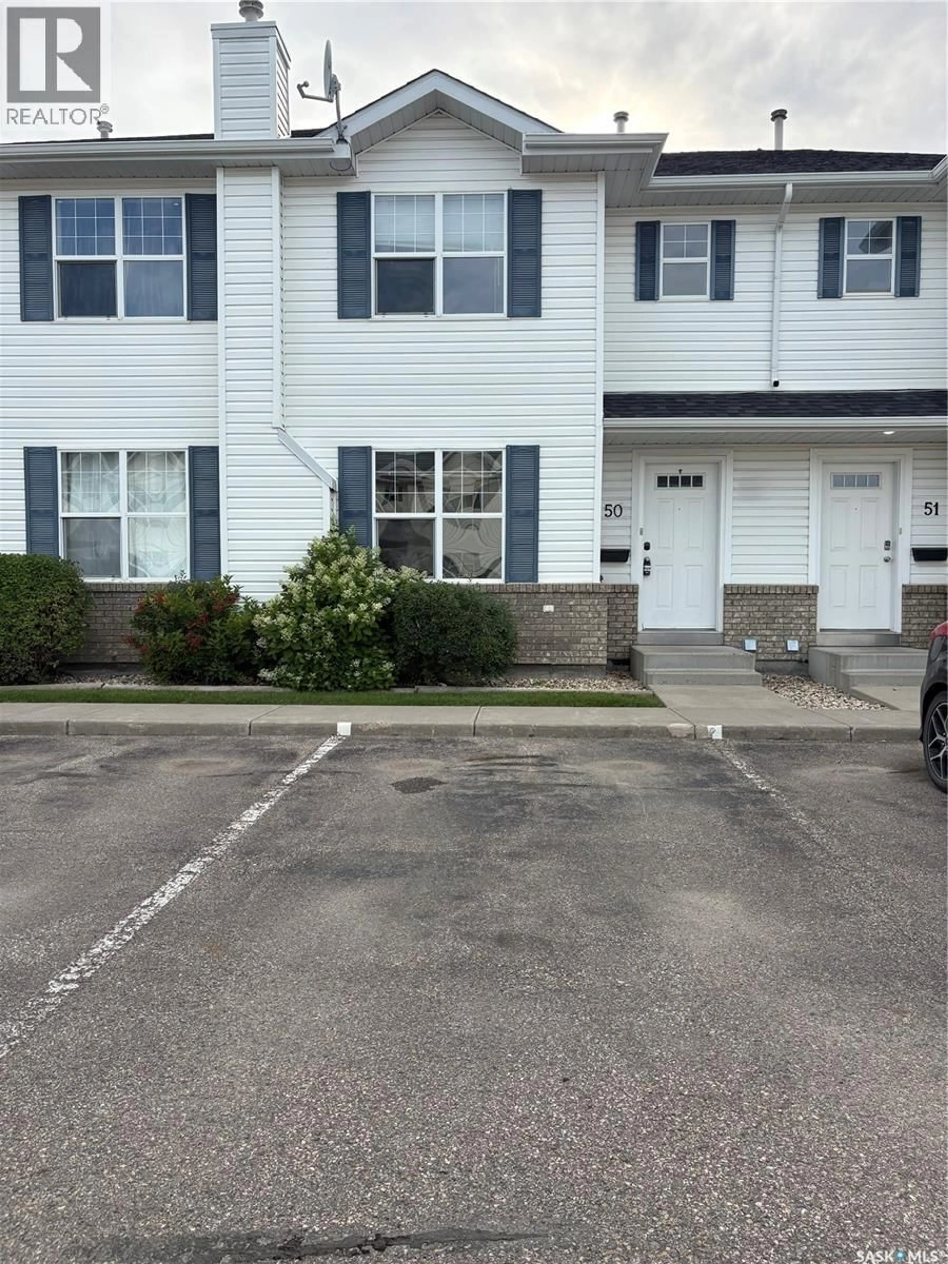 A pic from outside/outdoor area/front of a property/back of a property/a pic from drone, street for 50 203 HEROLD TERRACE, Saskatoon Saskatchewan S7V1H8