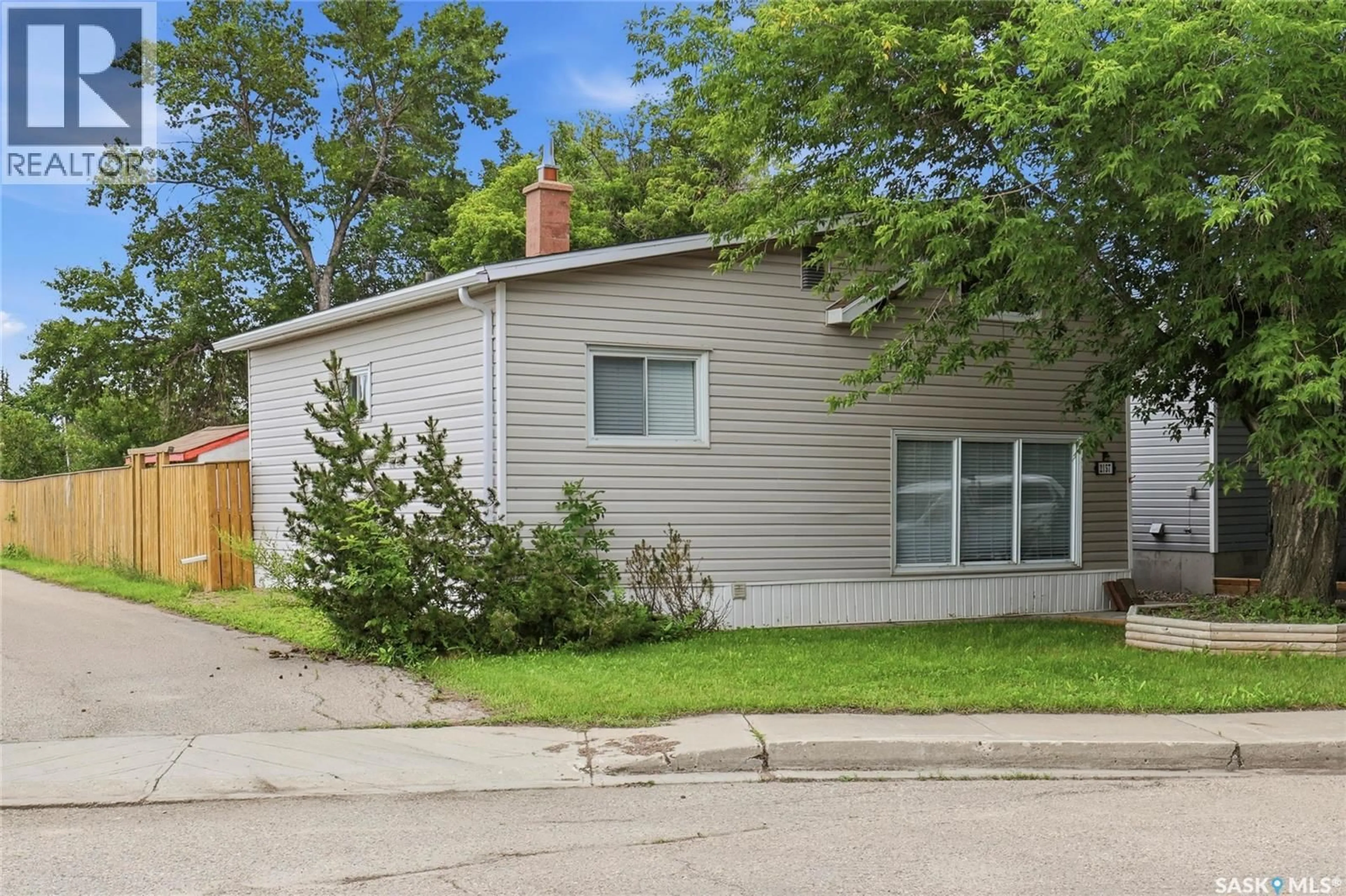Home with vinyl exterior material, street for 2157 FRANCIS STREET, Regina Saskatchewan S4N2P4