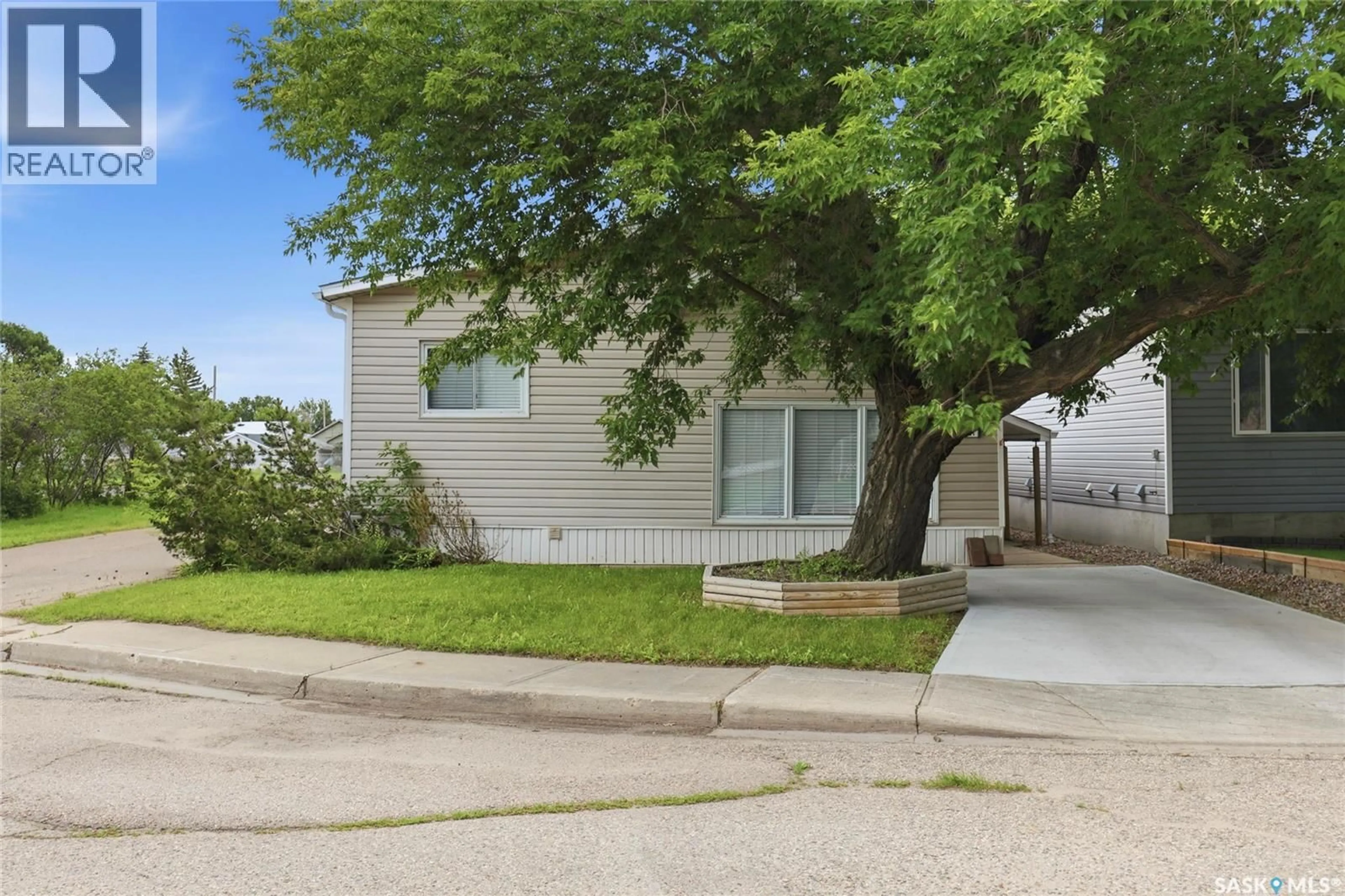 Home with vinyl exterior material, street for 2157 FRANCIS STREET, Regina Saskatchewan S4N2P4