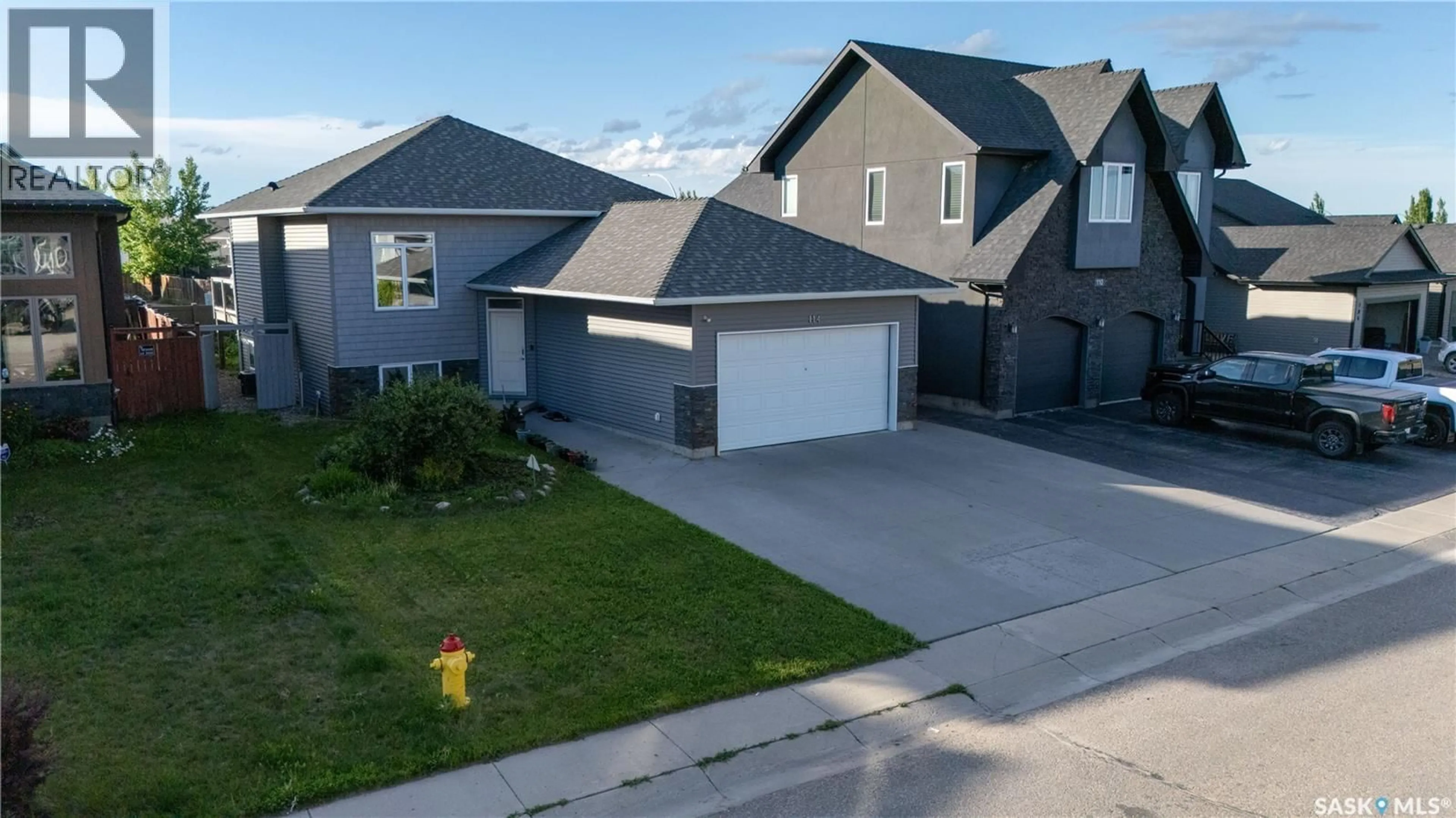 A pic from outside/outdoor area/front of a property/back of a property/a pic from drone, street for 114 PICHLER CRESCENT, Saskatoon Saskatchewan S7V0G5