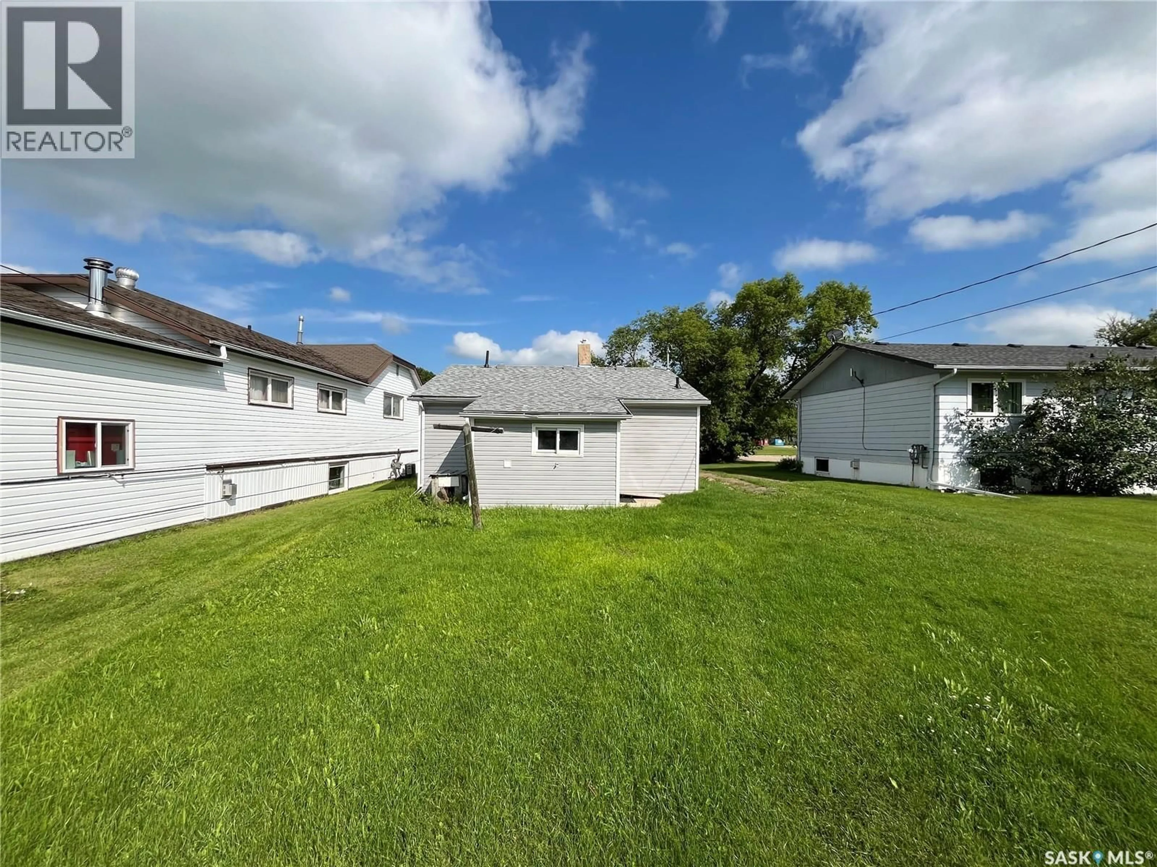 A pic from outside/outdoor area/front of a property/back of a property/a pic from drone, unknown for 218 BARROWS STREET, Maryfield Saskatchewan S0G3K0