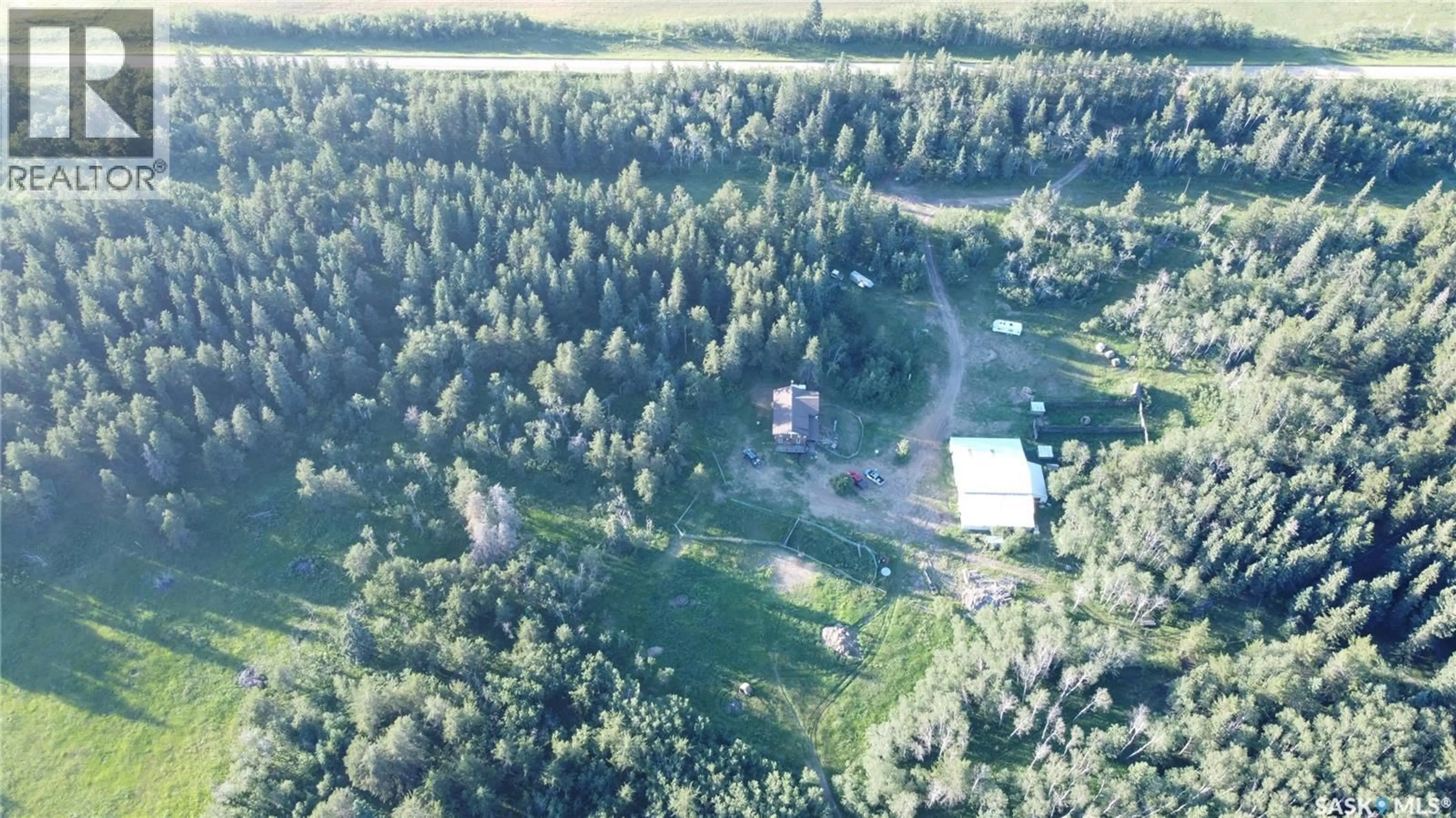A pic from outside/outdoor area/front of a property/back of a property/a pic from drone, forest/trees view for MEZZO ACREAGE, Duck Lake Rm No. 463 Saskatchewan S0K1J0