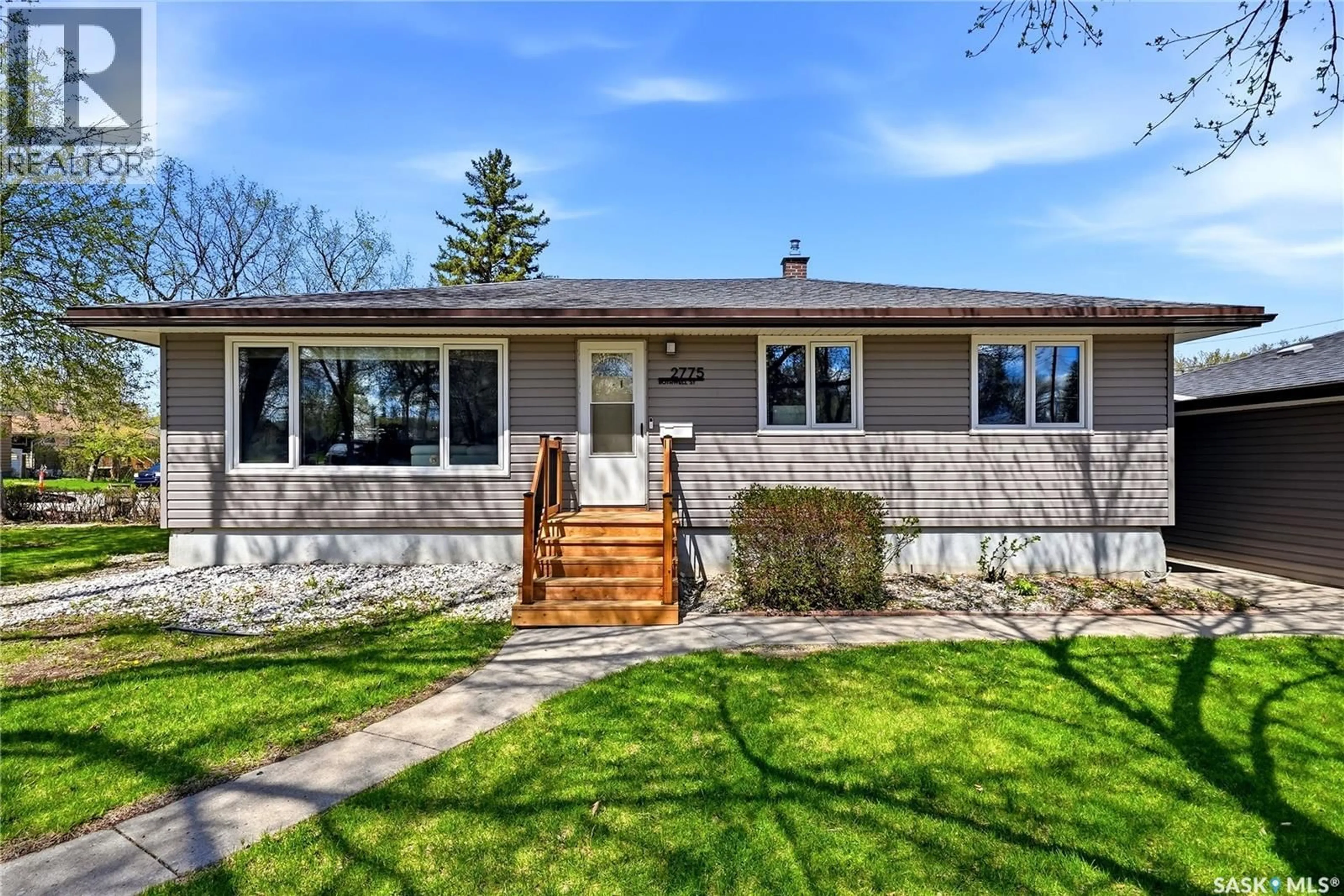 Home with vinyl exterior material, street for 2775 ROTHWELL STREET, Regina Saskatchewan S4N2E3