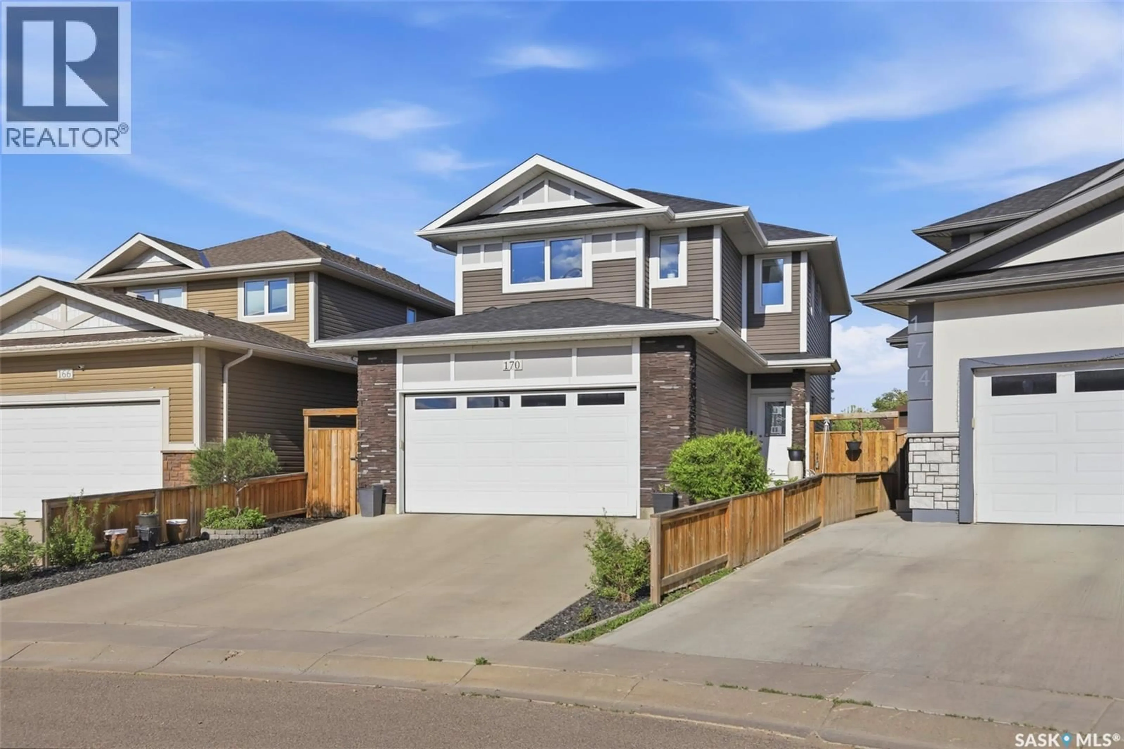 Home with vinyl exterior material, street for 170 PALLISER COURT, Saskatoon Saskatchewan S7L4P9