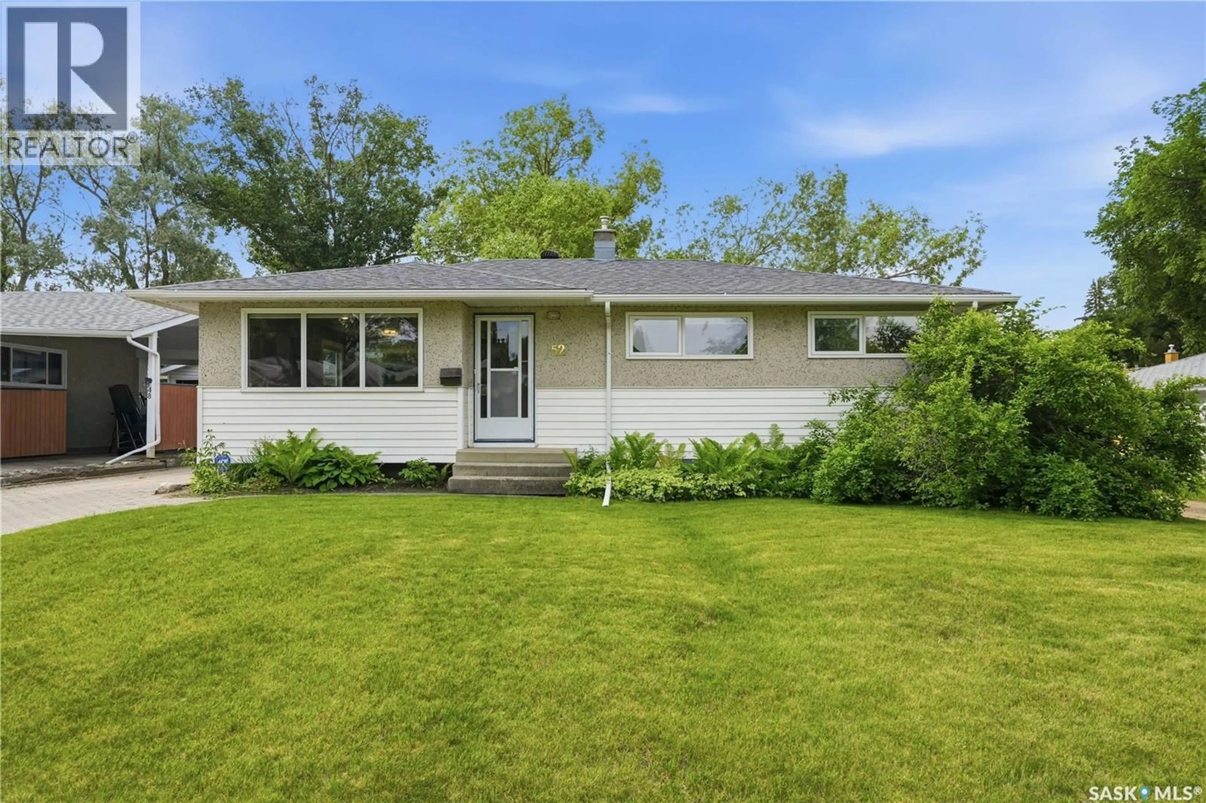 Home with vinyl exterior material, street for 52 TUCKER CRESCENT, Saskatoon Saskatchewan S7H3H5