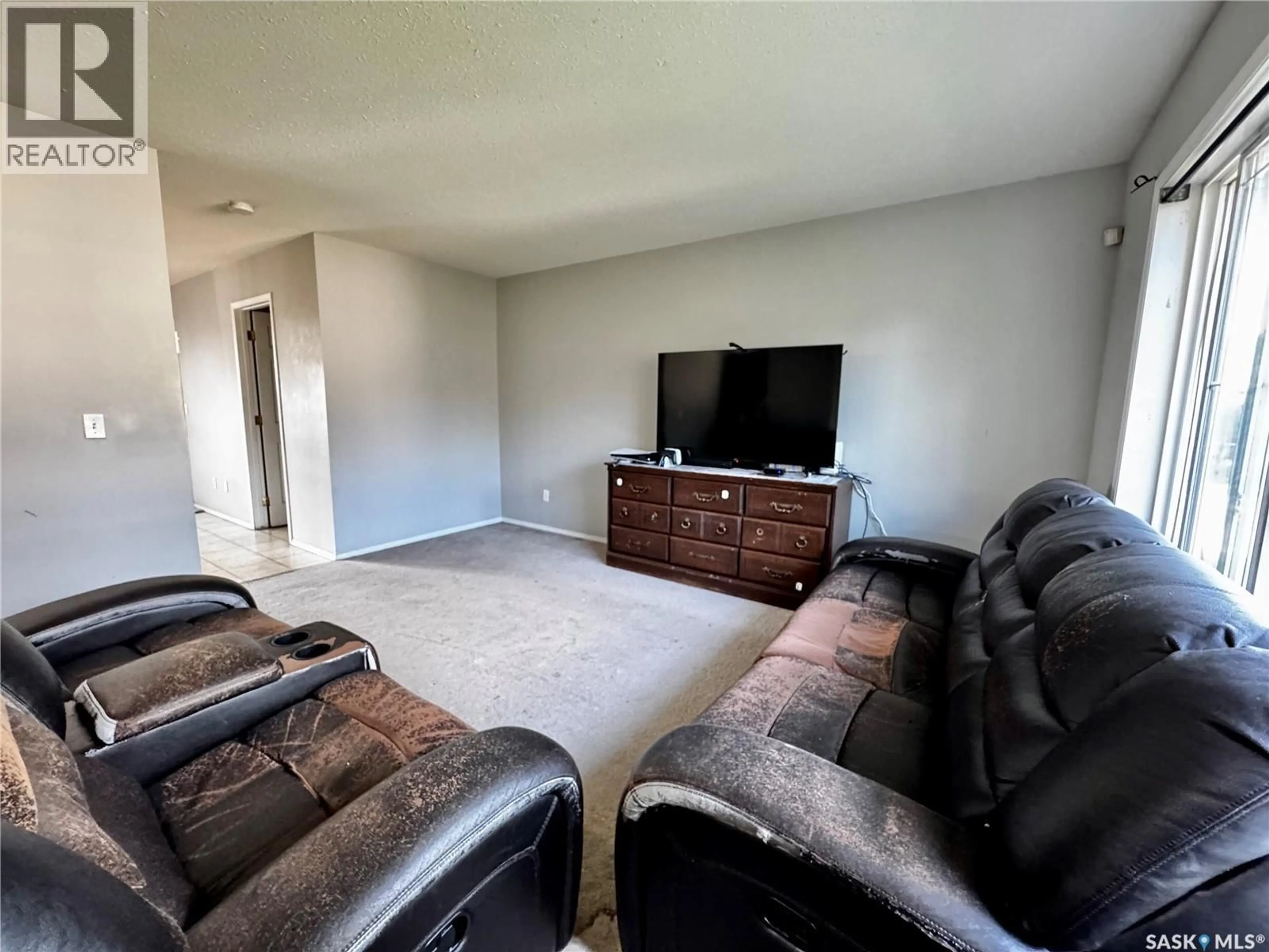 Living room with furniture, unknown for 115th E - 2 95 STREET, Saskatoon Saskatchewan S7N2E1