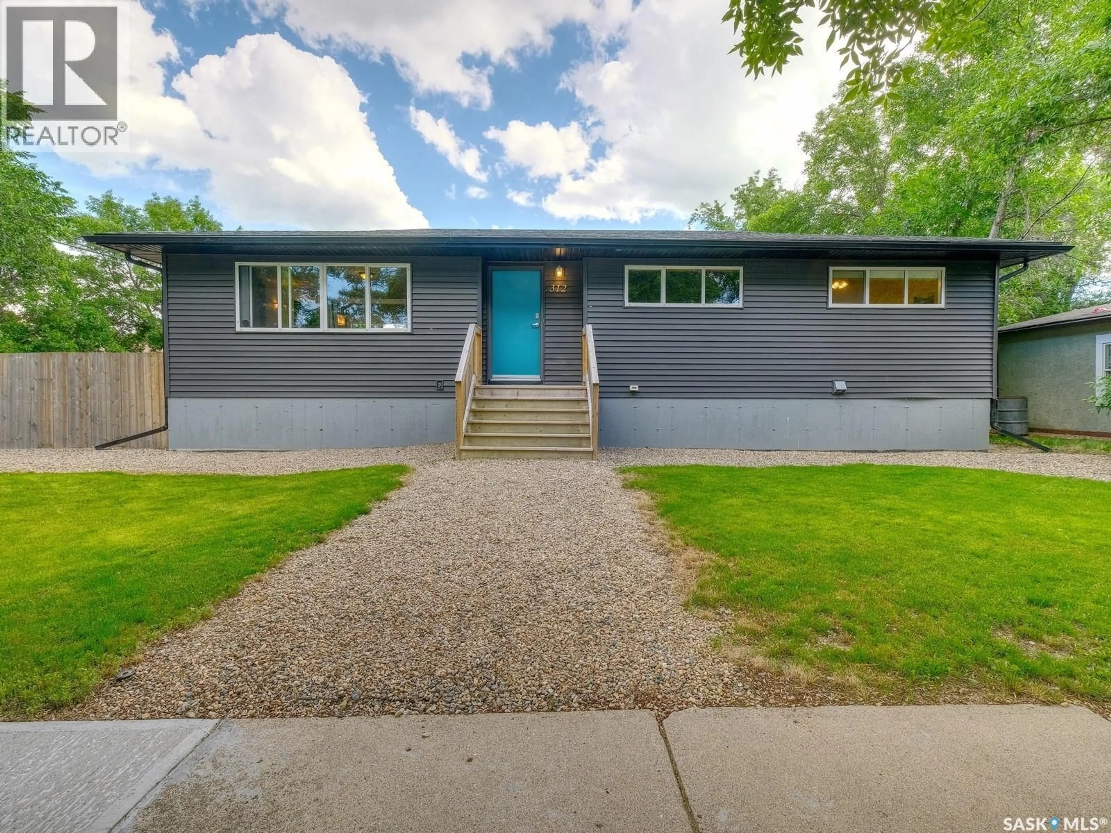 Home with vinyl exterior material, street for 312 4TH AVENUE, Rosetown Saskatchewan S0L2V0