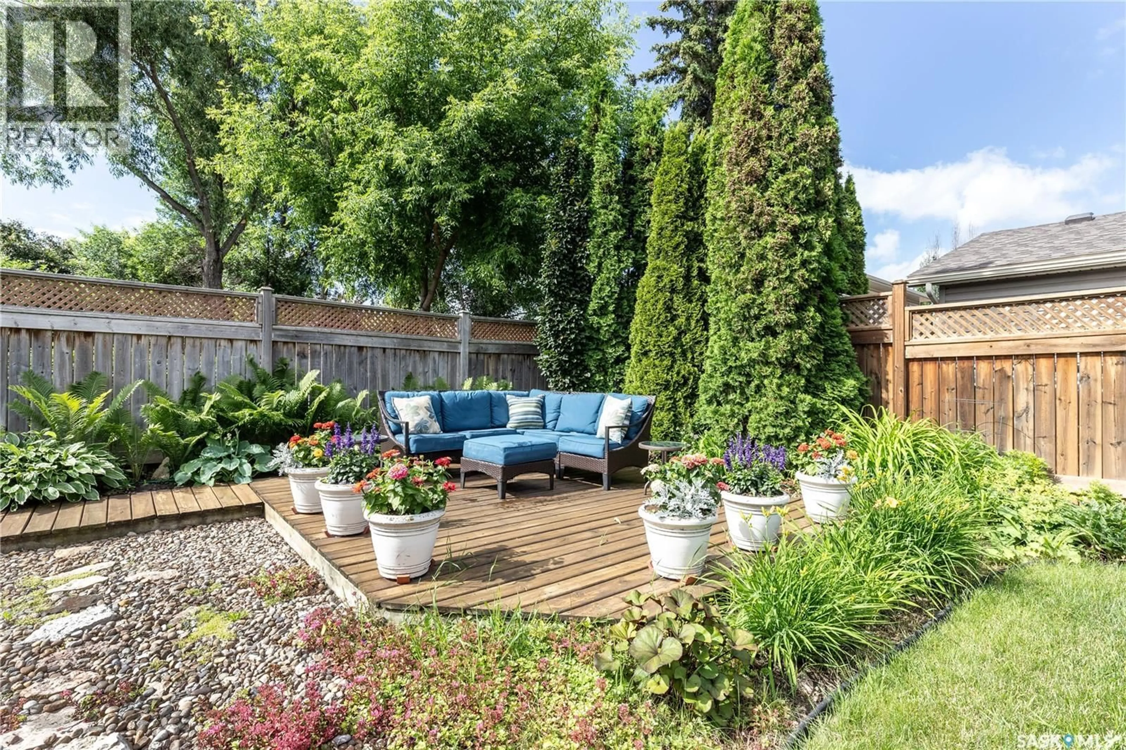 Patio, street for 102 WAKAW CRESCENT, Saskatoon Saskatchewan S7J4E2