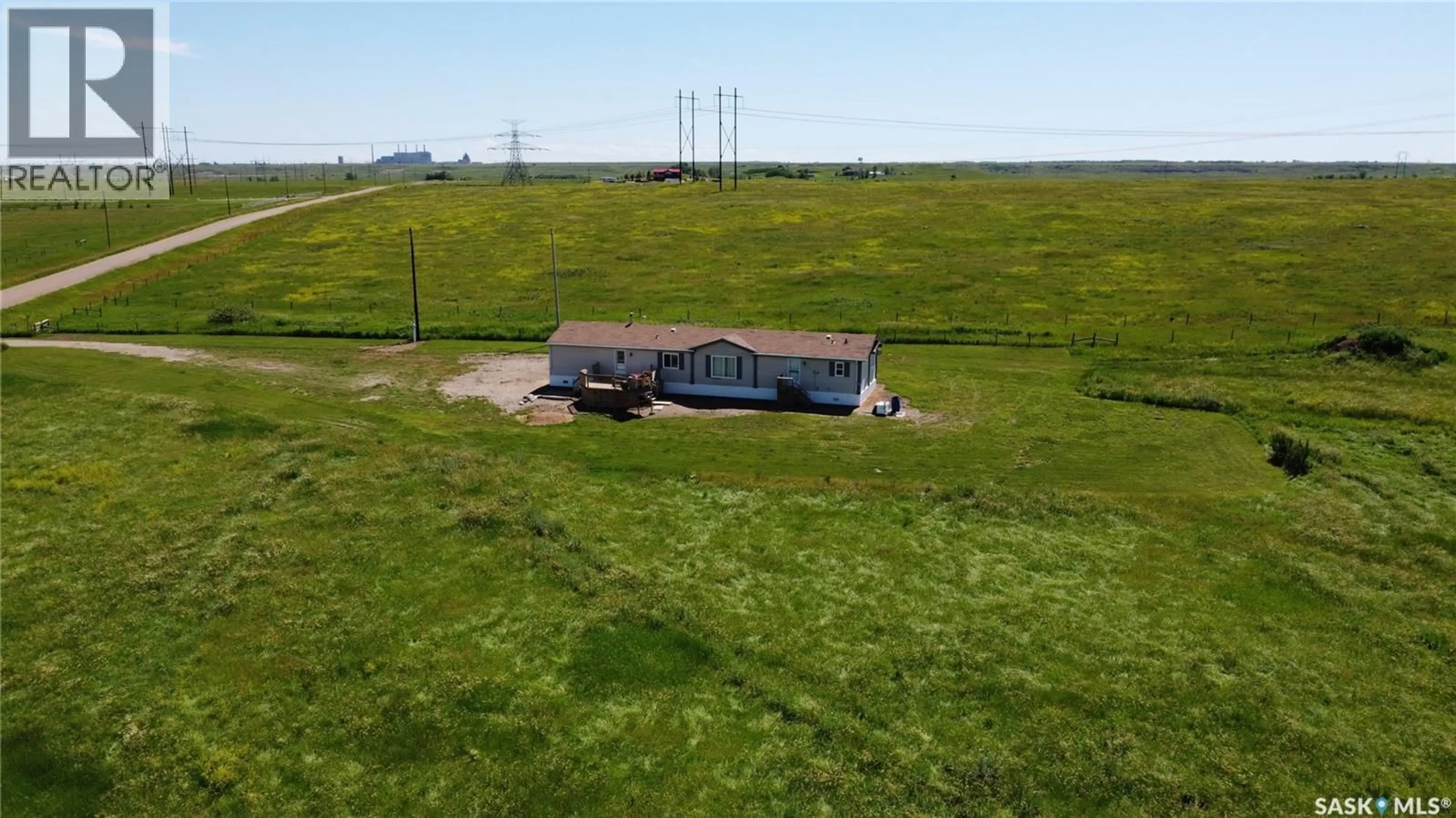 A pic from outside/outdoor area/front of a property/back of a property/a pic from drone, building for 5 TESSIER ACREAGE ACRES, Estevan Rm No. 5 Saskatchewan S4A2A4