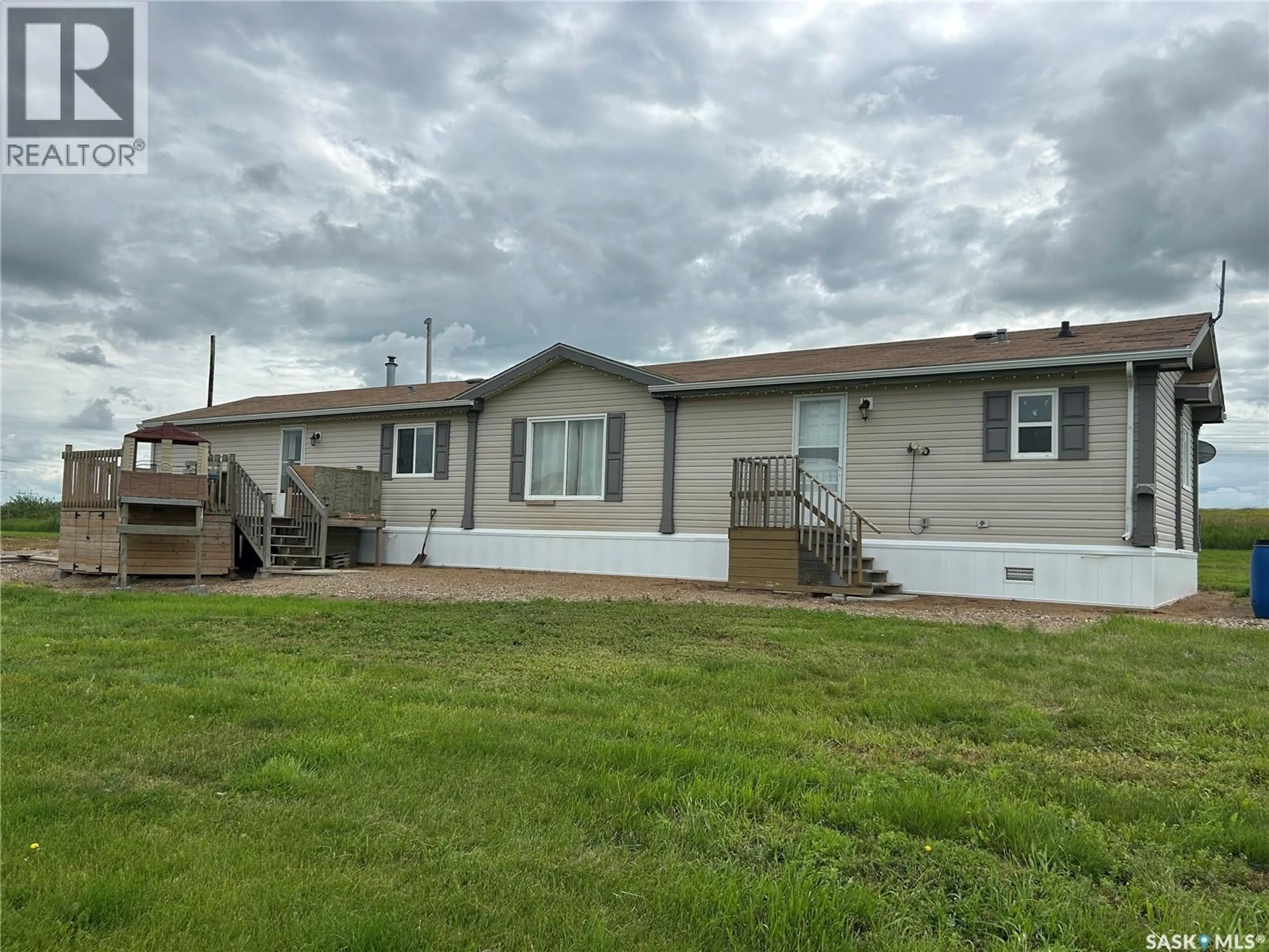 Home with vinyl exterior material, street for 5 TESSIER ACREAGE ACRES, Estevan Rm No. 5 Saskatchewan S4A2A4