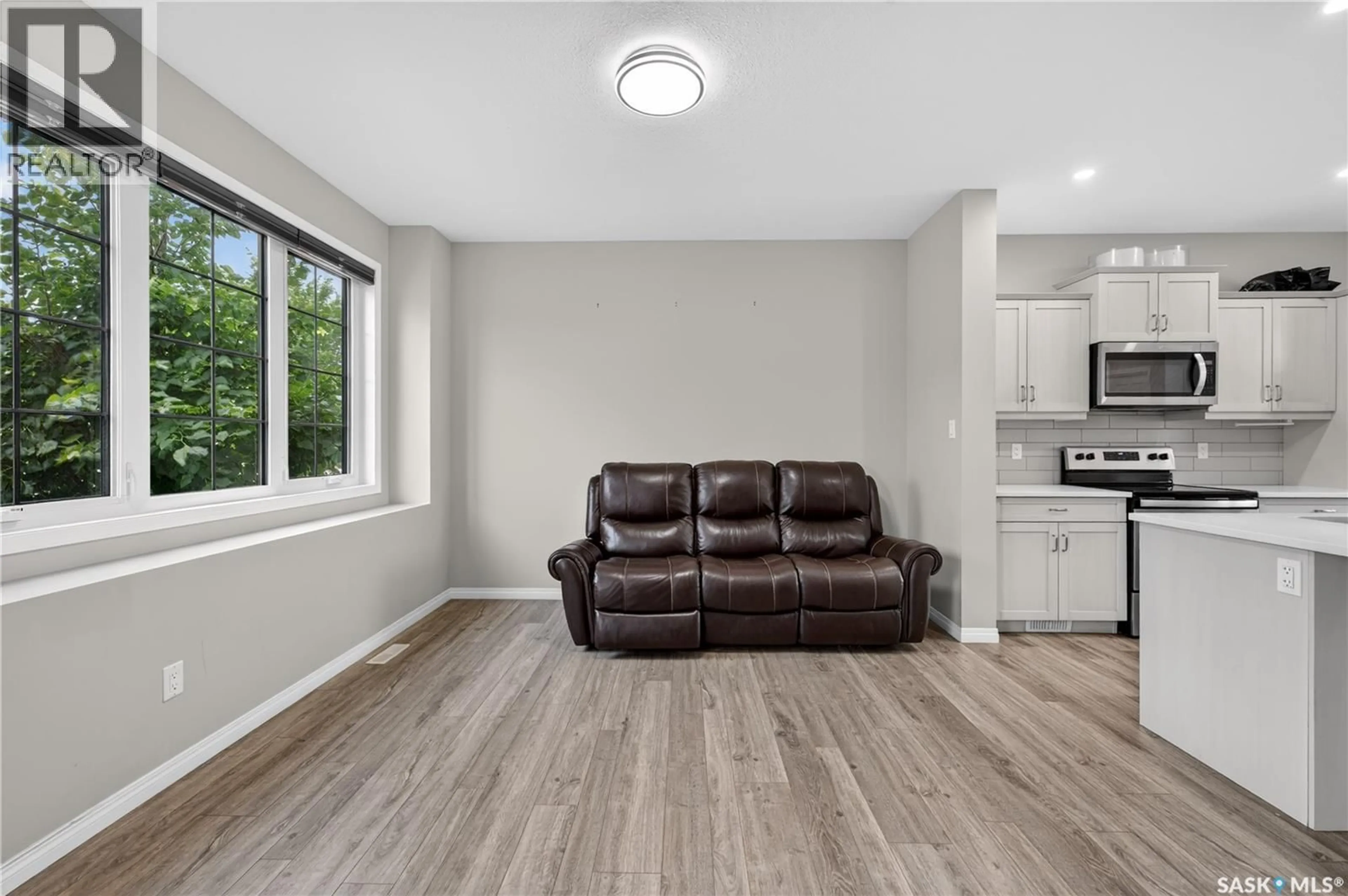 Living room with furniture, unknown for 3281 CHUKA BOULEVARD, Regina Saskatchewan S4V3K7