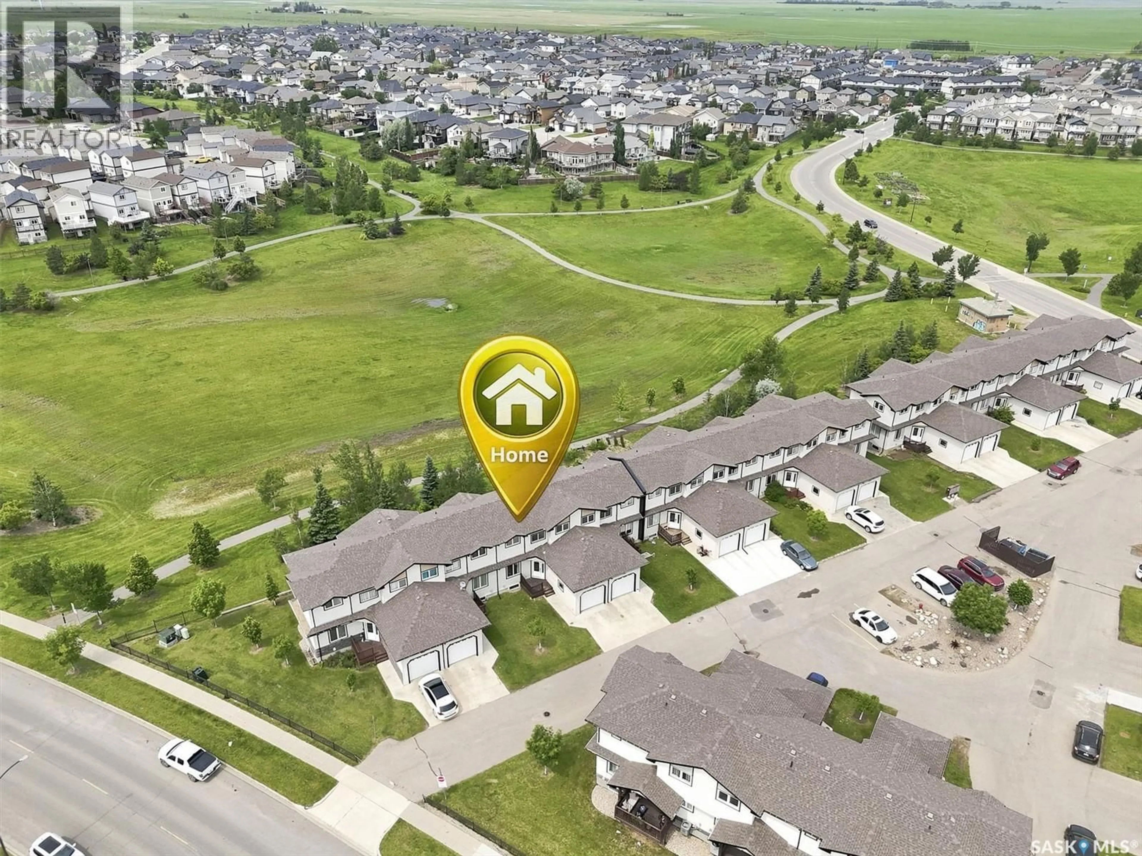 A pic from outside/outdoor area/front of a property/back of a property/a pic from drone, street for 6 118 HAMPTON CIRCLE, Saskatoon Saskatchewan S7R0C9