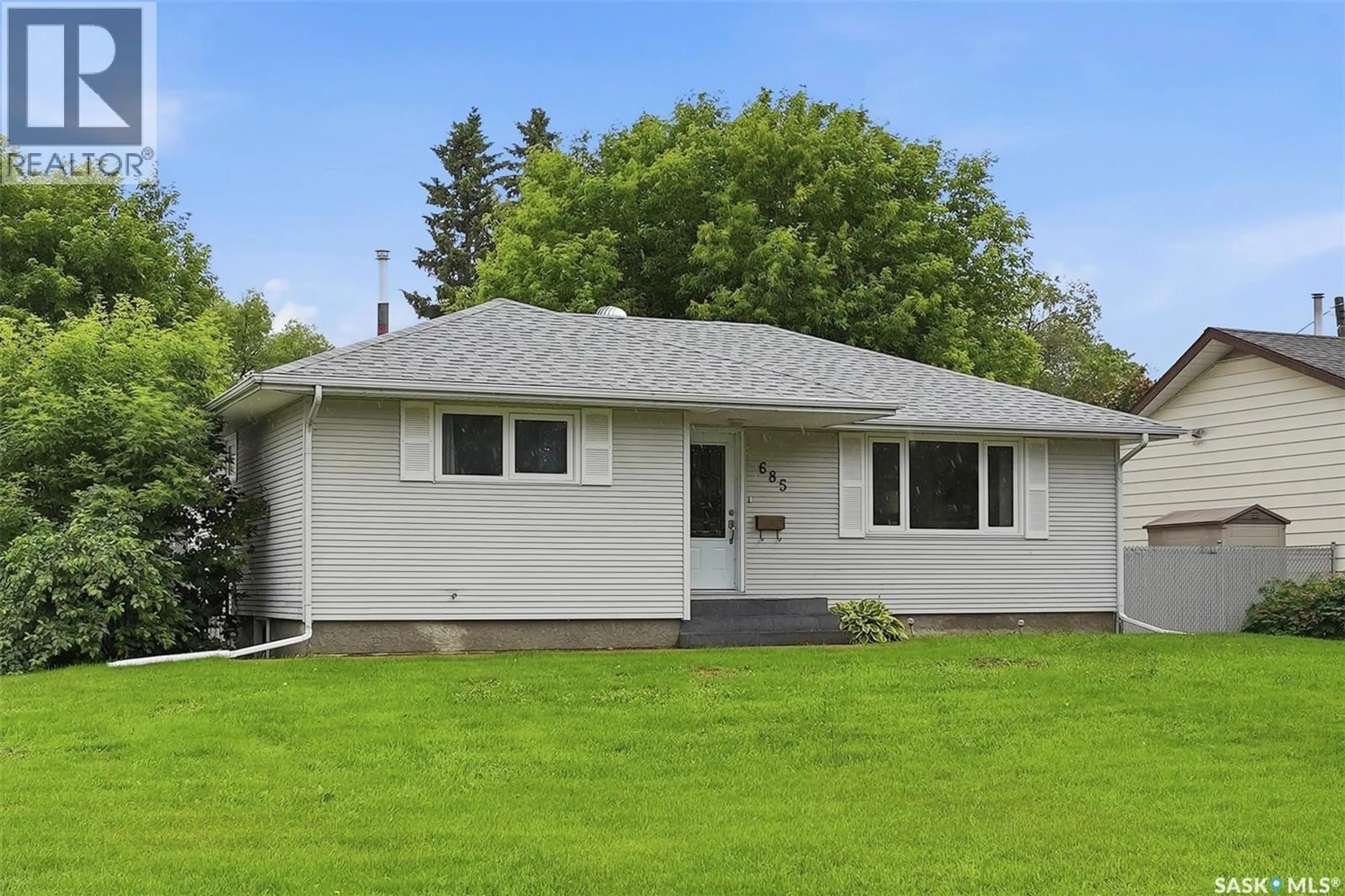 Home with vinyl exterior material, street for 685 RIVER STREET, Prince Albert Saskatchewan S6V0H8