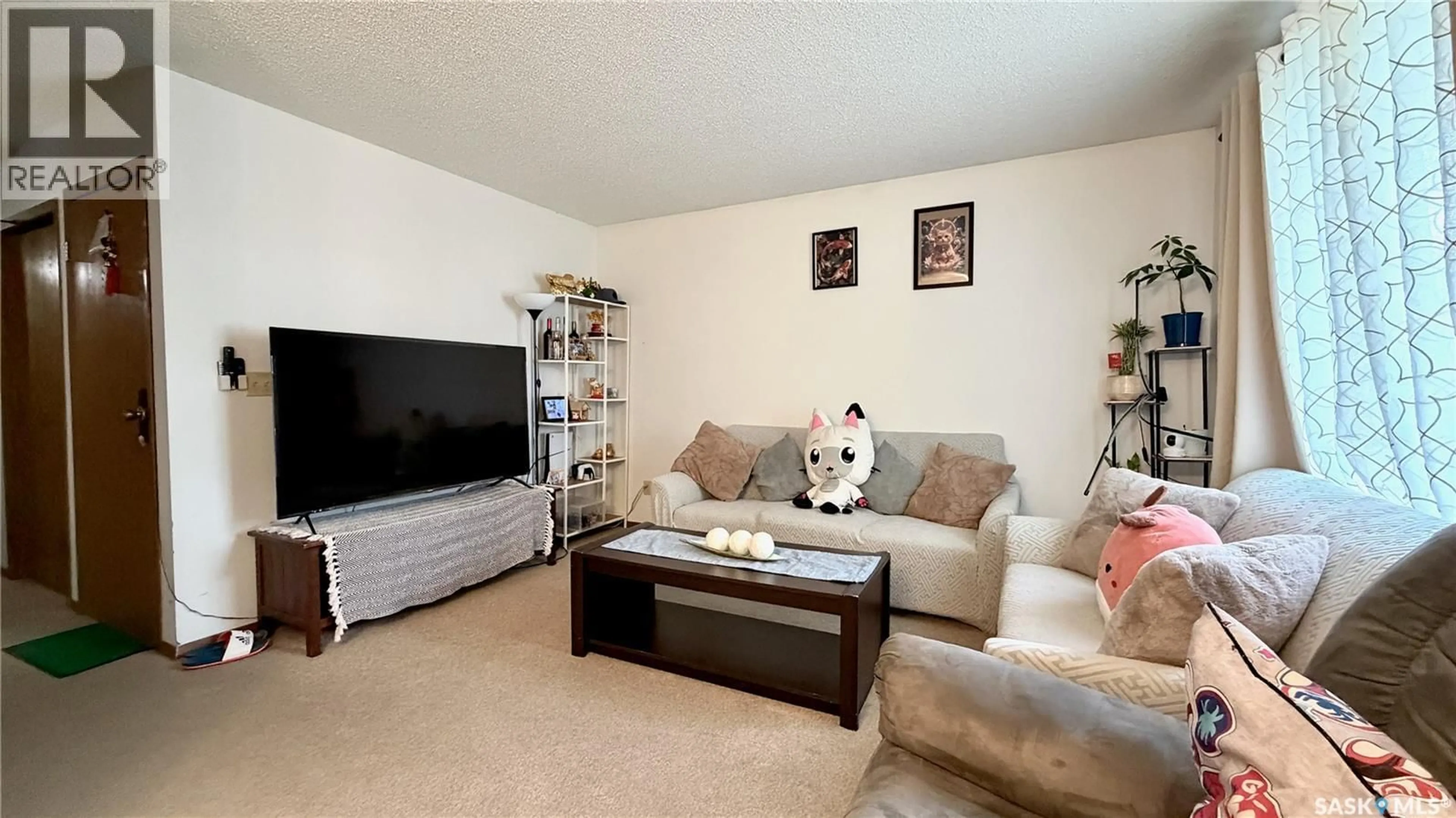 Living room with furniture, unknown for 409 109TH STREET, Saskatoon Saskatchewan S7N1R8