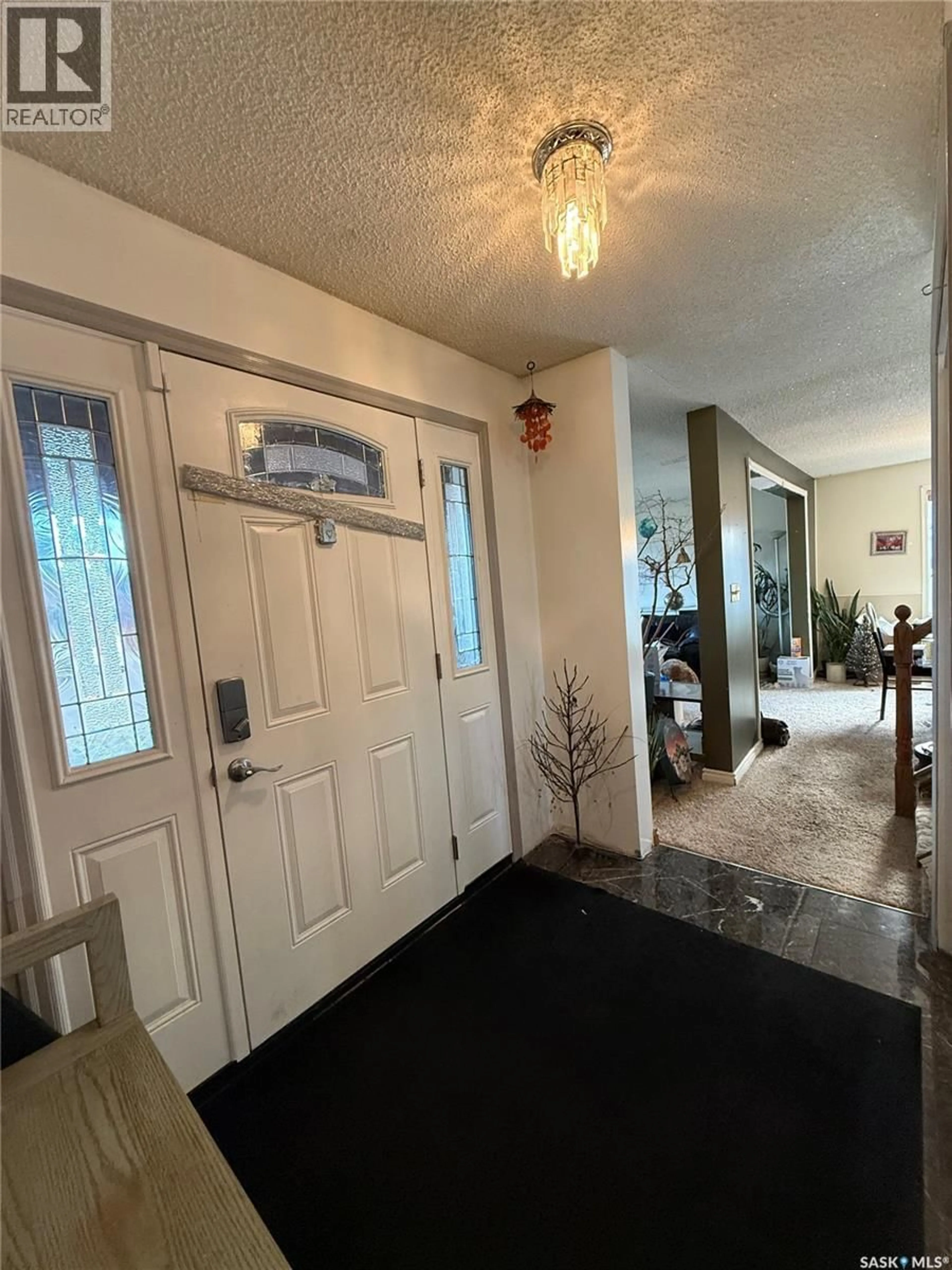 Indoor entryway for 101 306 CREAN CRESCENT, Saskatoon Saskatchewan S7J3X2