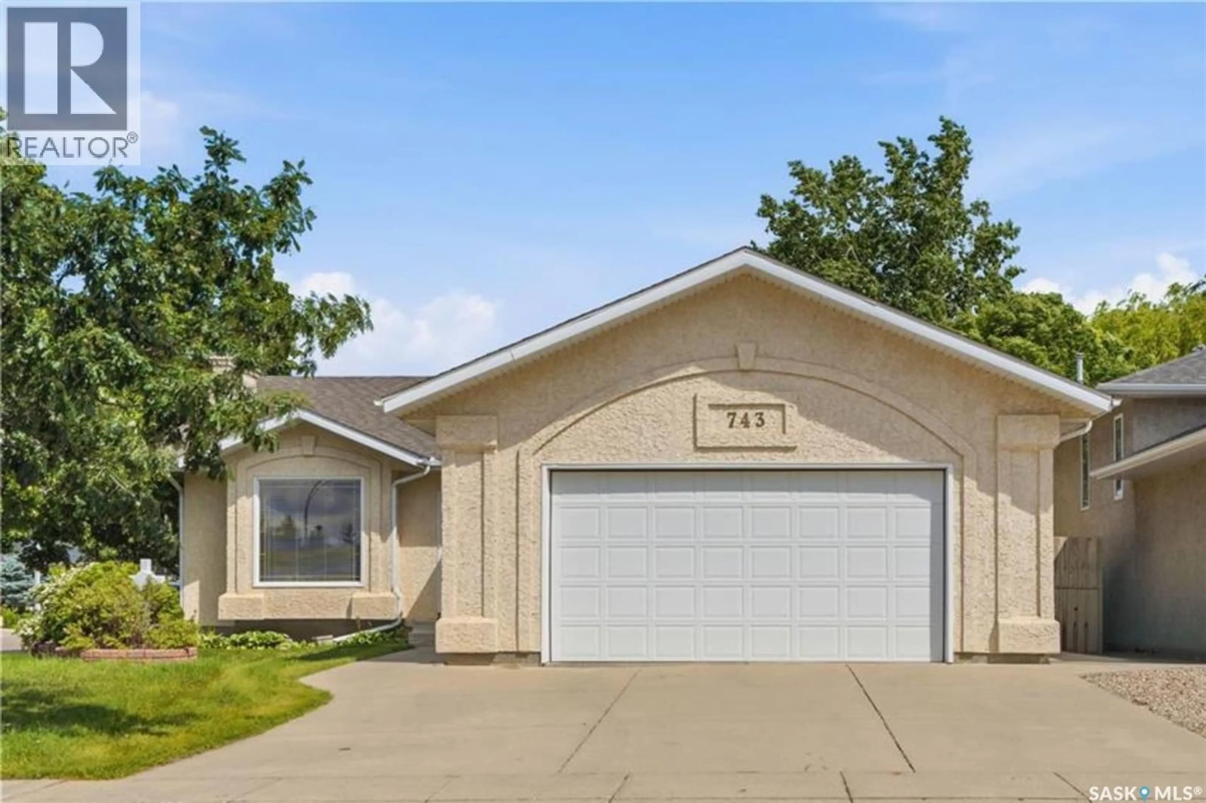 Home with vinyl exterior material, street for 743 PEZER COURT, Saskatoon Saskatchewan S7S1J8