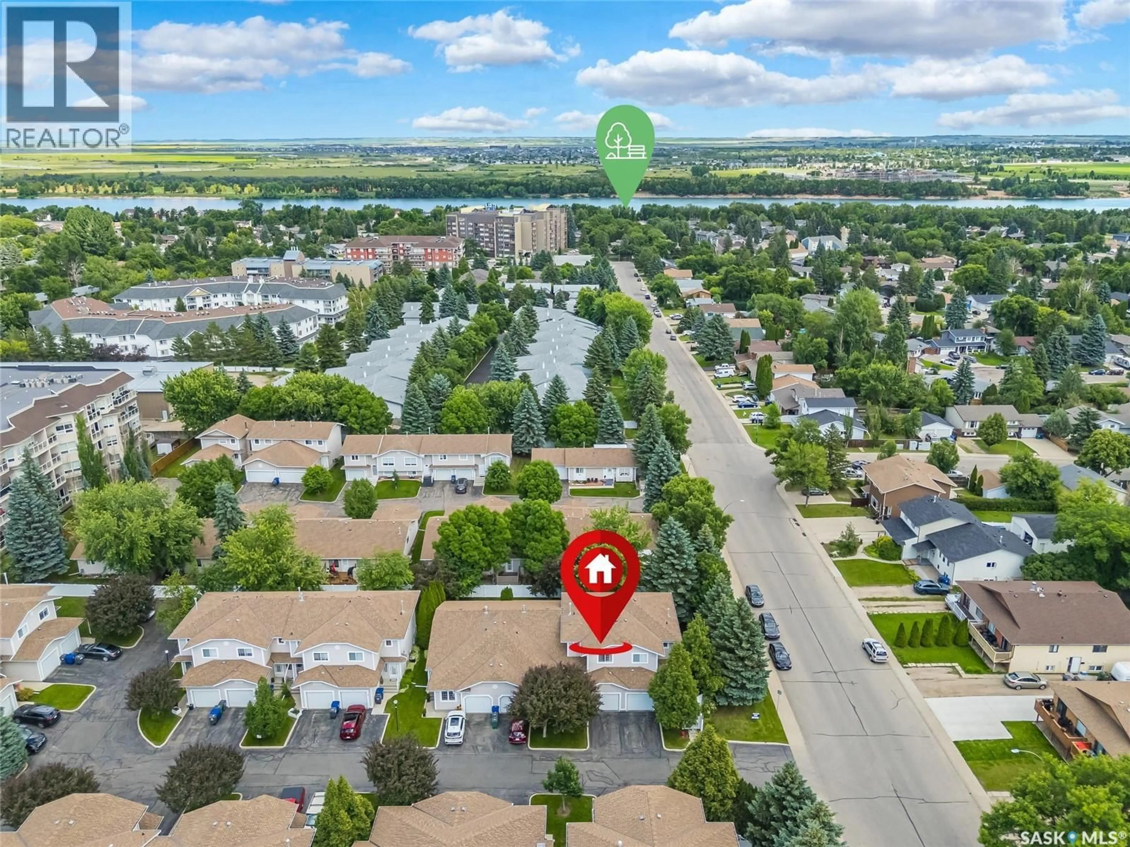 A pic from outside/outdoor area/front of a property/back of a property/a pic from drone, street for 123 212 LA RONGE ROAD, Saskatoon Saskatchewan S7K8E5