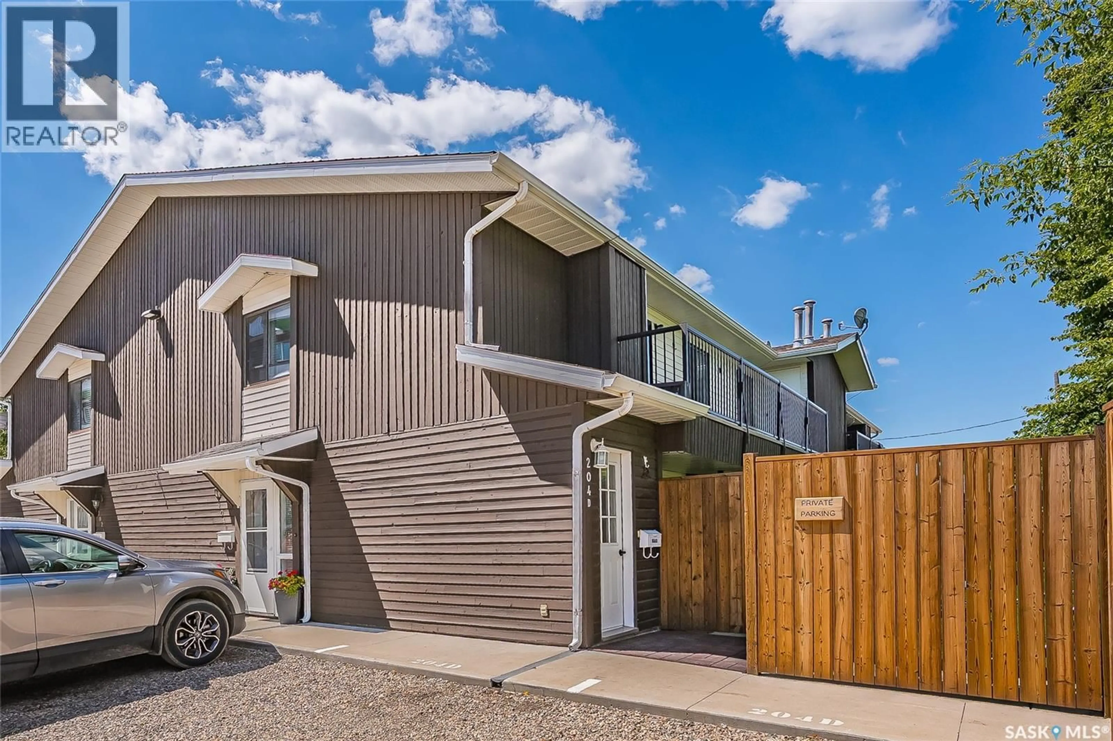 A pic from outside/outdoor area/front of a property/back of a property/a pic from drone, street for 204D 213 MAIN STREET, Martensville Saskatchewan S0K2T0