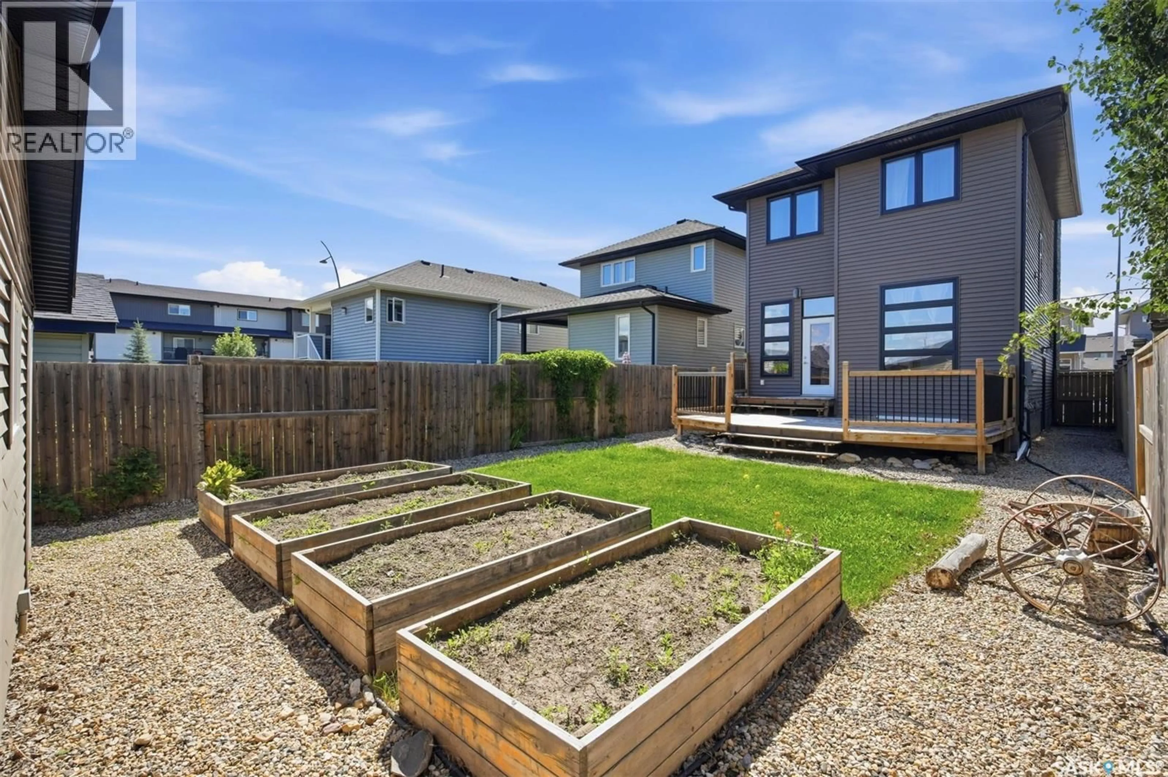 A pic from outside/outdoor area/front of a property/back of a property/a pic from drone, street for 190 RAJPUT WAY, Saskatoon Saskatchewan S7W0L5