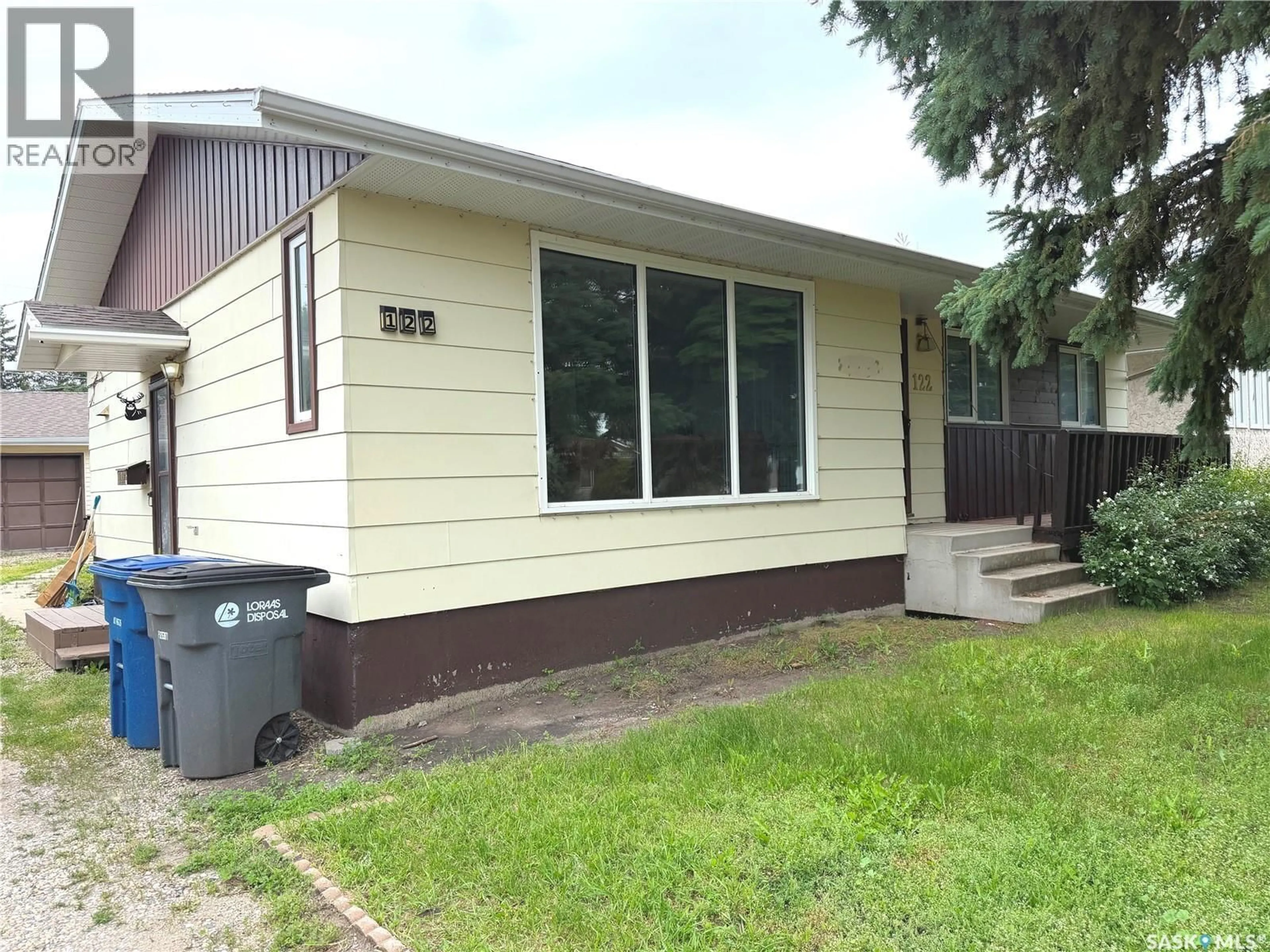 Home with vinyl exterior material, street for 112 DIANNE STREET, Balcarres Saskatchewan S0G0C0