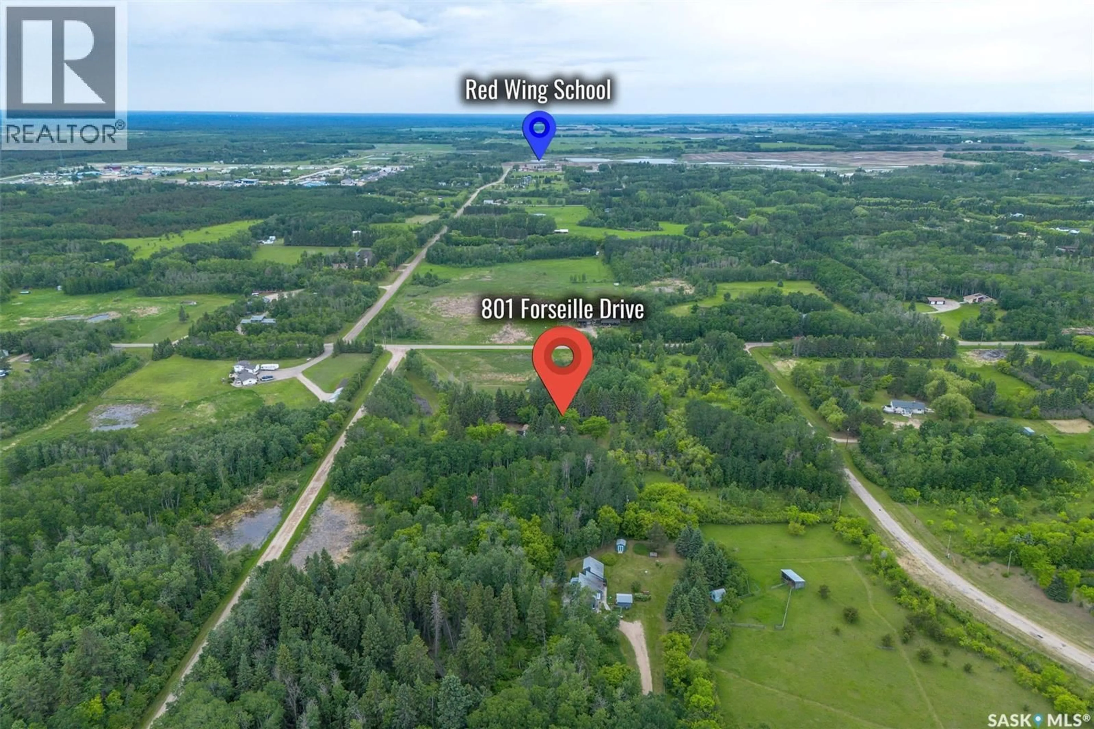 A pic from outside/outdoor area/front of a property/back of a property/a pic from drone, forest/trees view for 801 FORSEILLE DRIVE, Buckland Rm No. 491 Saskatchewan S6V5R3