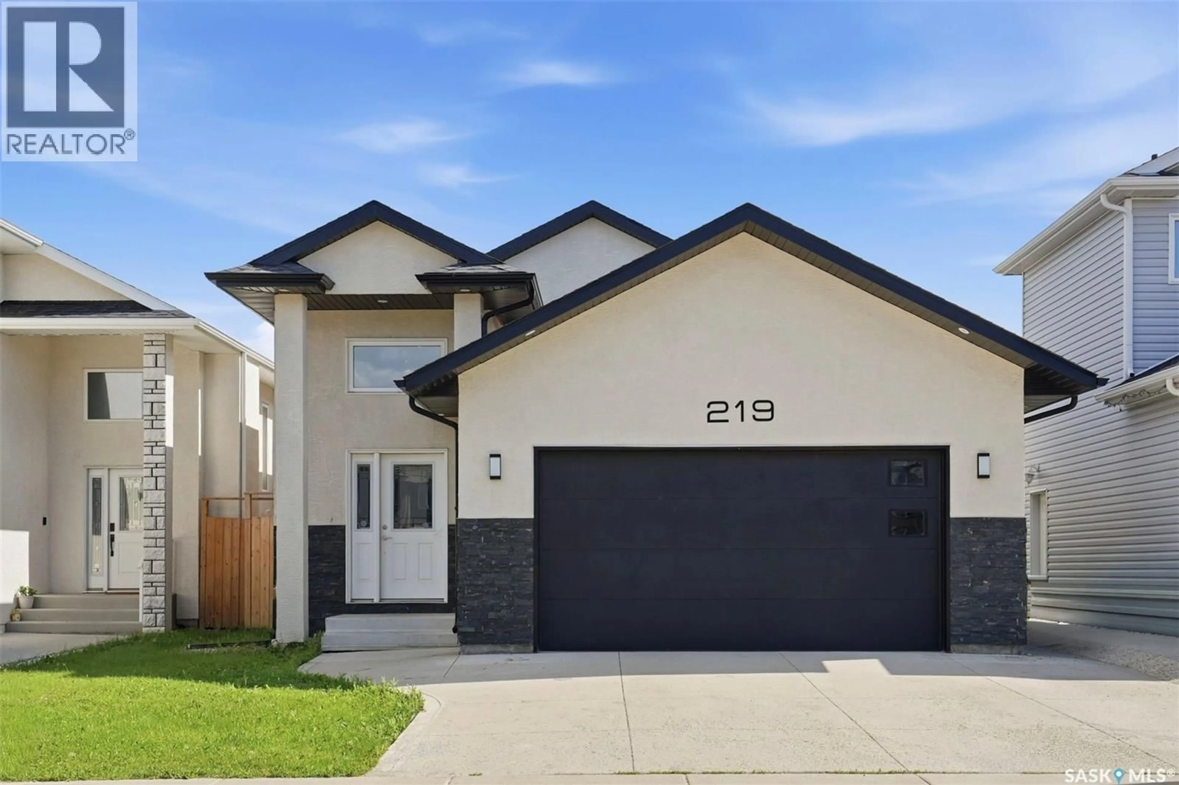 Home with vinyl exterior material, street for 219 ELLS CRESCENT, Saskatoon Saskatchewan S7L6J4