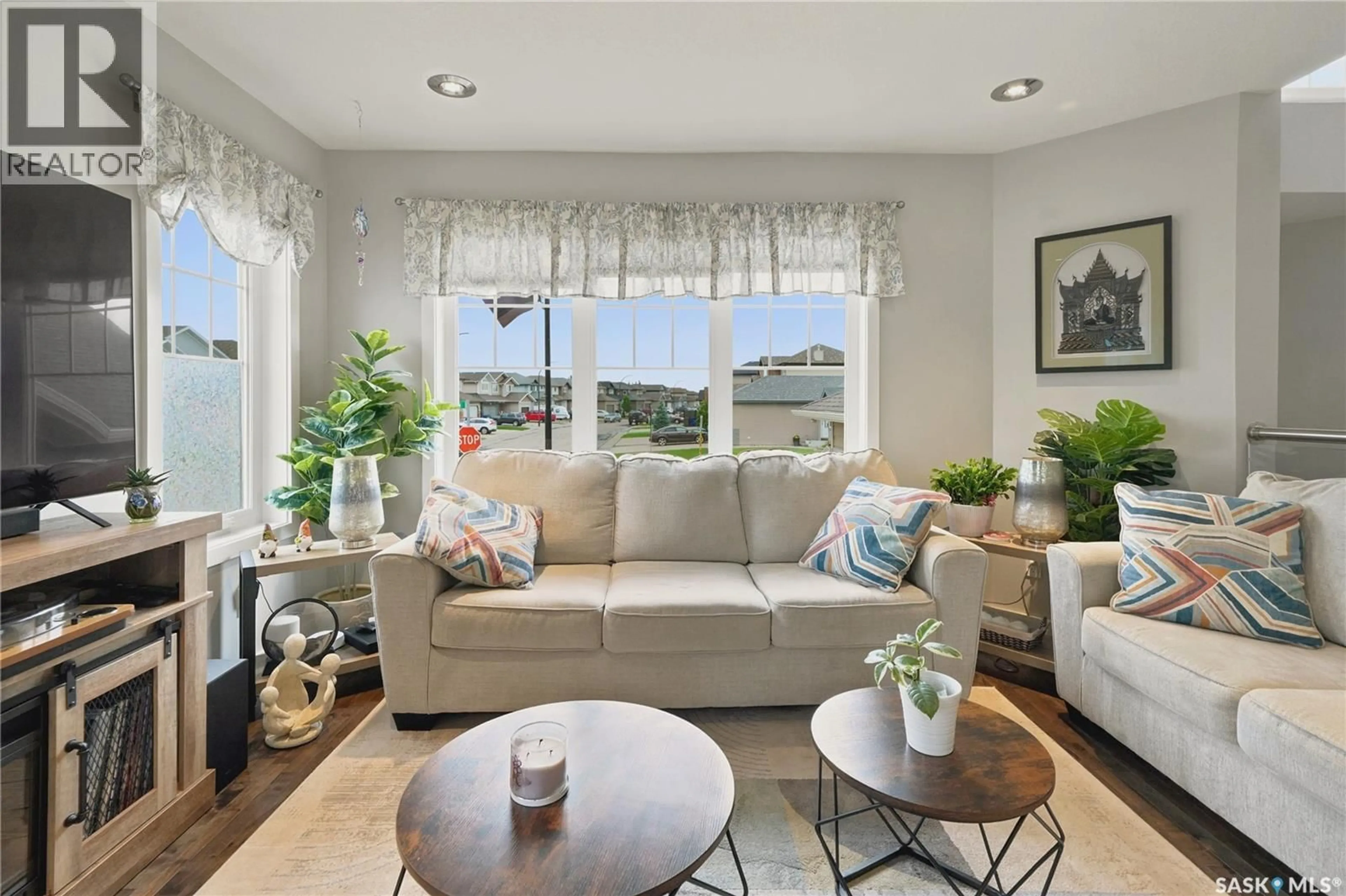 Living room with furniture, unknown for E - 303 EAST HAMPTON BOULEVARD, Saskatoon Saskatchewan S7R0A5