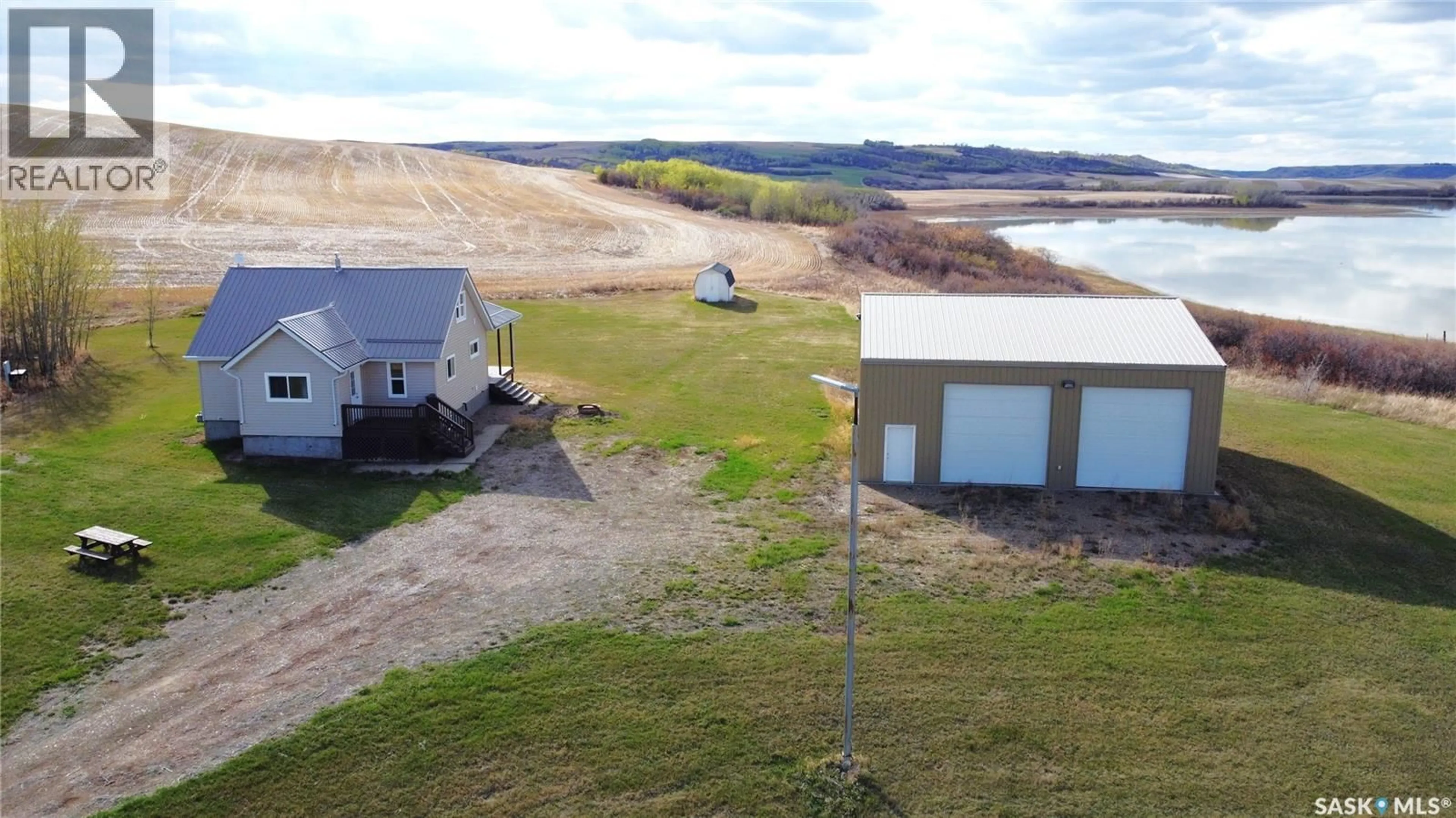 A pic from outside/outdoor area/front of a property/back of a property/a pic from drone, water/lake/river/ocean view for Acreage - 29 HIGHWAY SOUTH, Battle River Rm No. 438 Saskatchewan S0M0E0