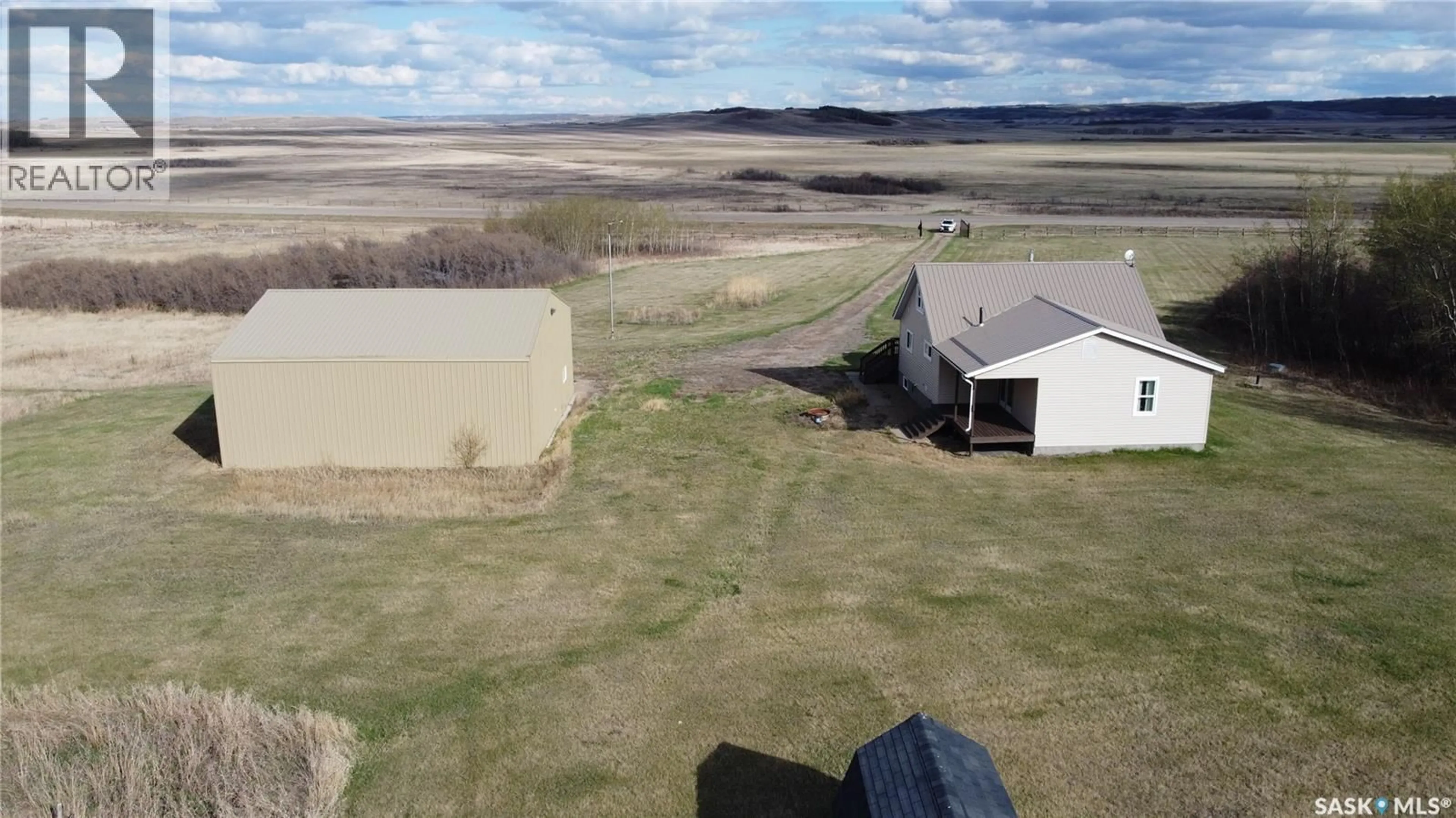 A pic from outside/outdoor area/front of a property/back of a property/a pic from drone, water/lake/river/ocean view for Acreage - 29 HIGHWAY SOUTH, Battle River Rm No. 438 Saskatchewan S0M0E0