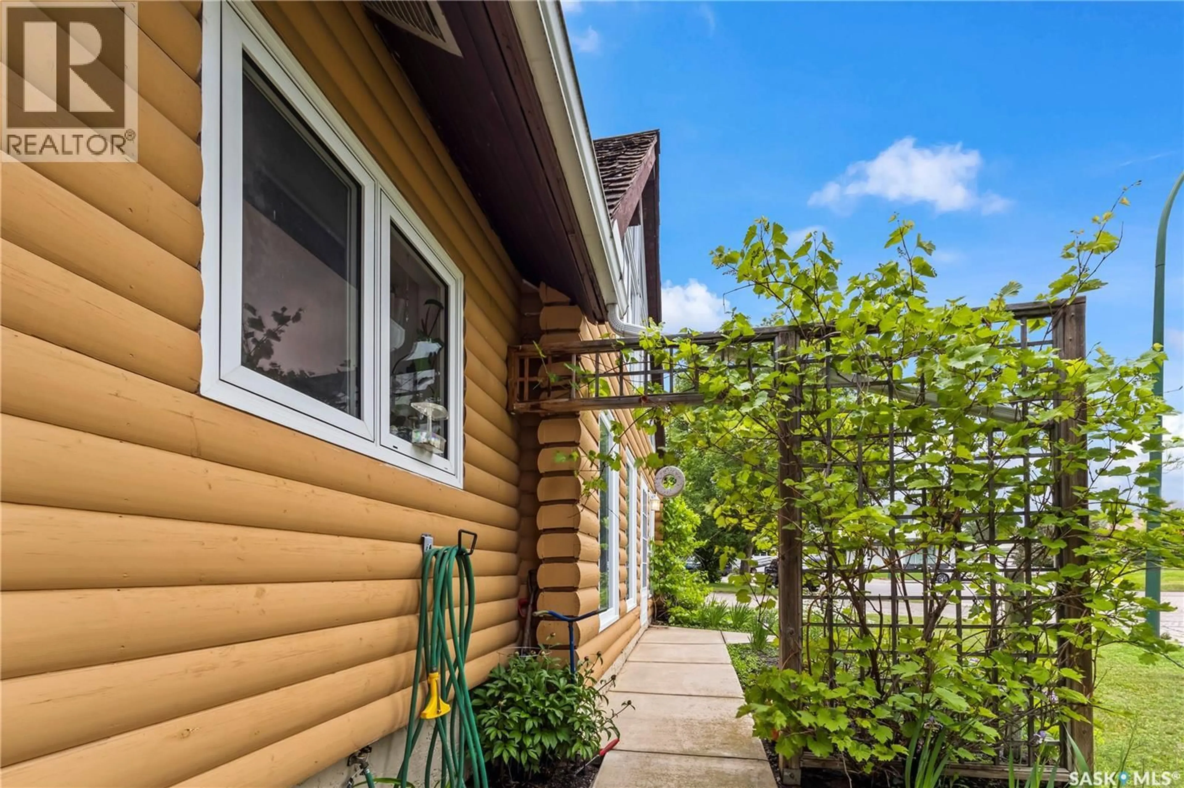 Home with vinyl exterior material, street for 1312 REED BAY, Prince Albert Saskatchewan S6V6R4
