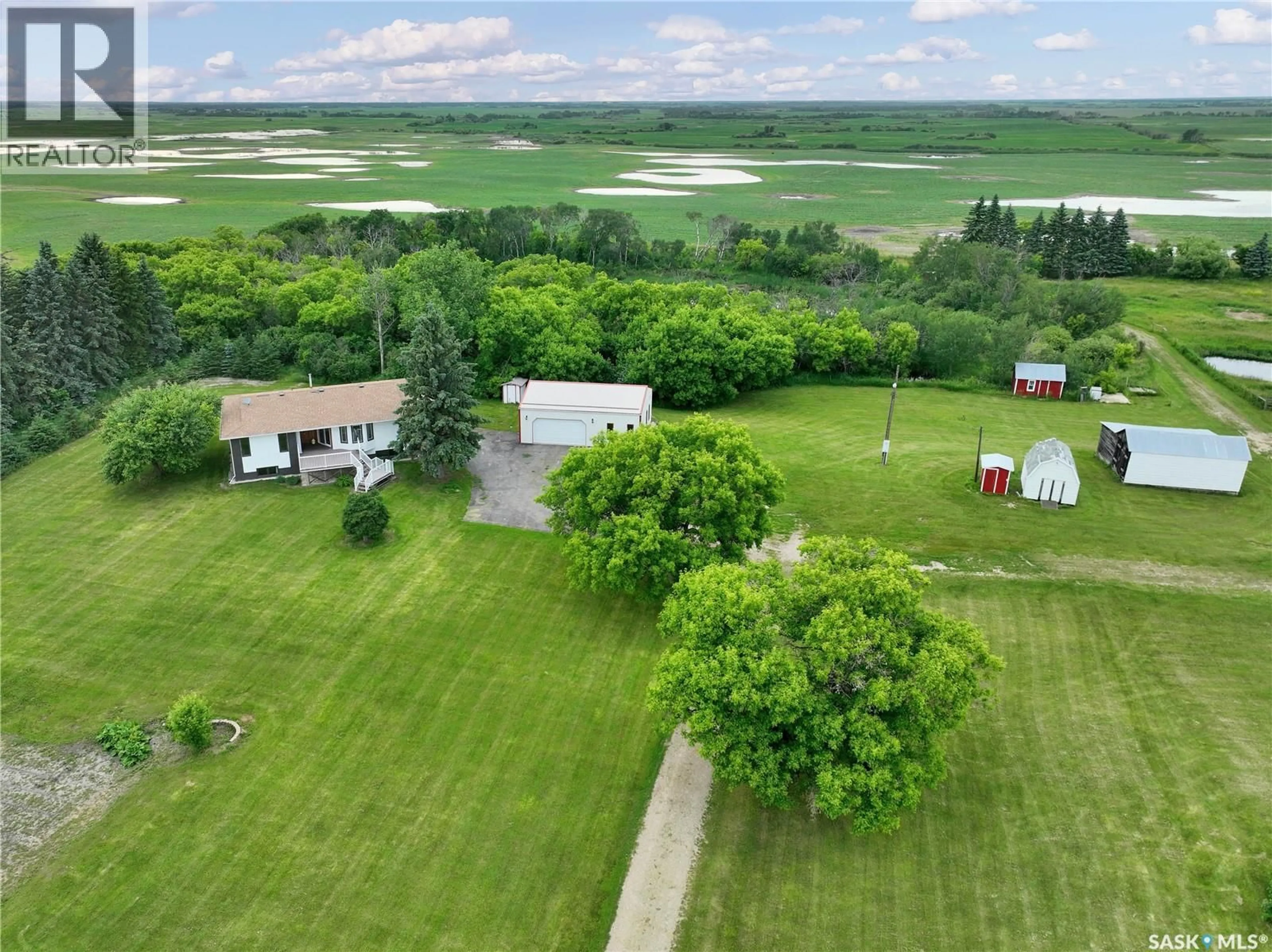 A pic from outside/outdoor area/front of a property/back of a property/a pic from drone, water/lake/river/ocean view for 9 RED BARN ACREAGE, Fertile Belt Rm No. 183 Saskatchewan S0A3Y0