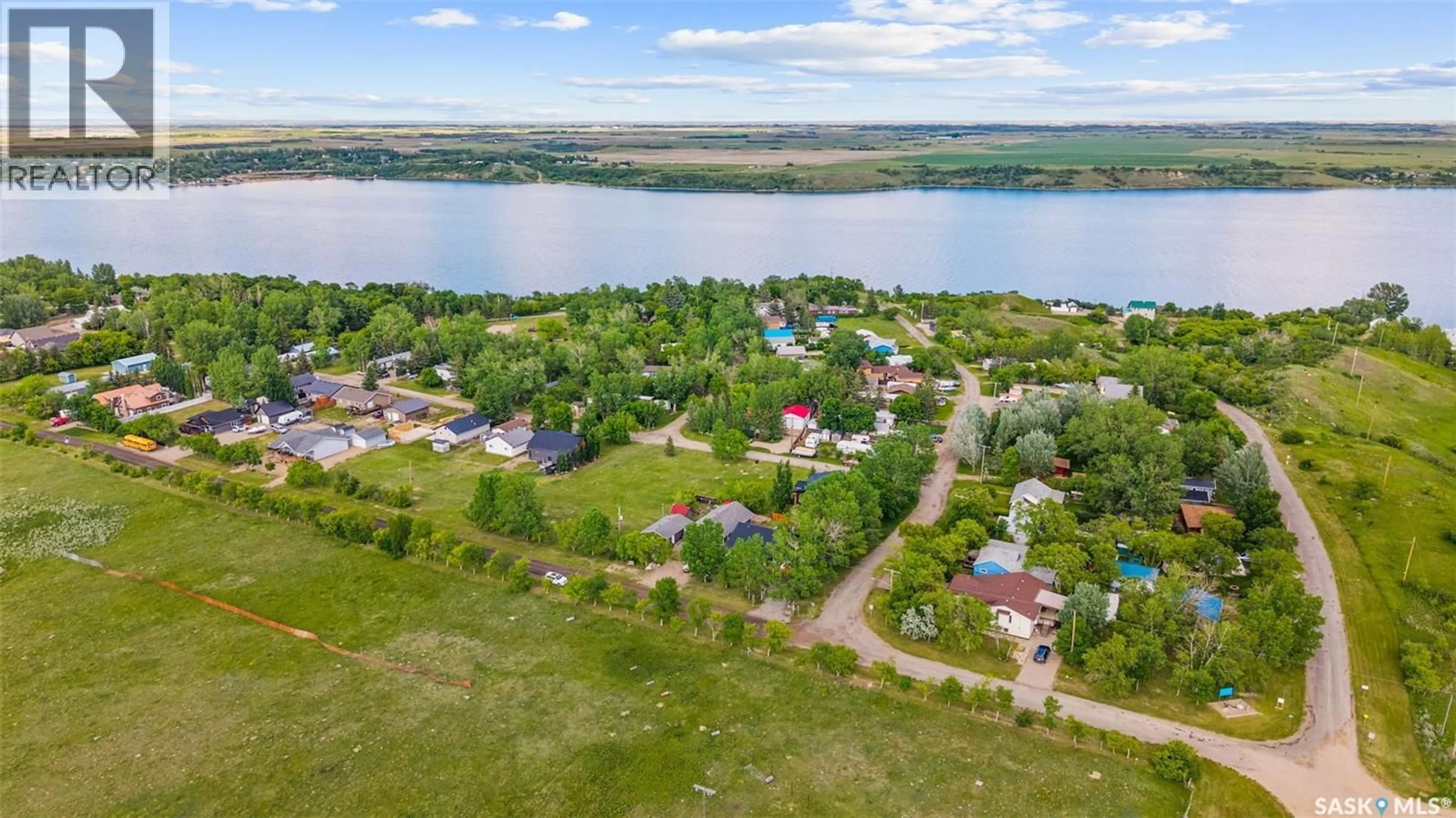 A pic from outside/outdoor area/front of a property/back of a property/a pic from drone, water/lake/river/ocean view for 3 POPLAR STREET, Grandview Beach Saskatchewan S0G1C0