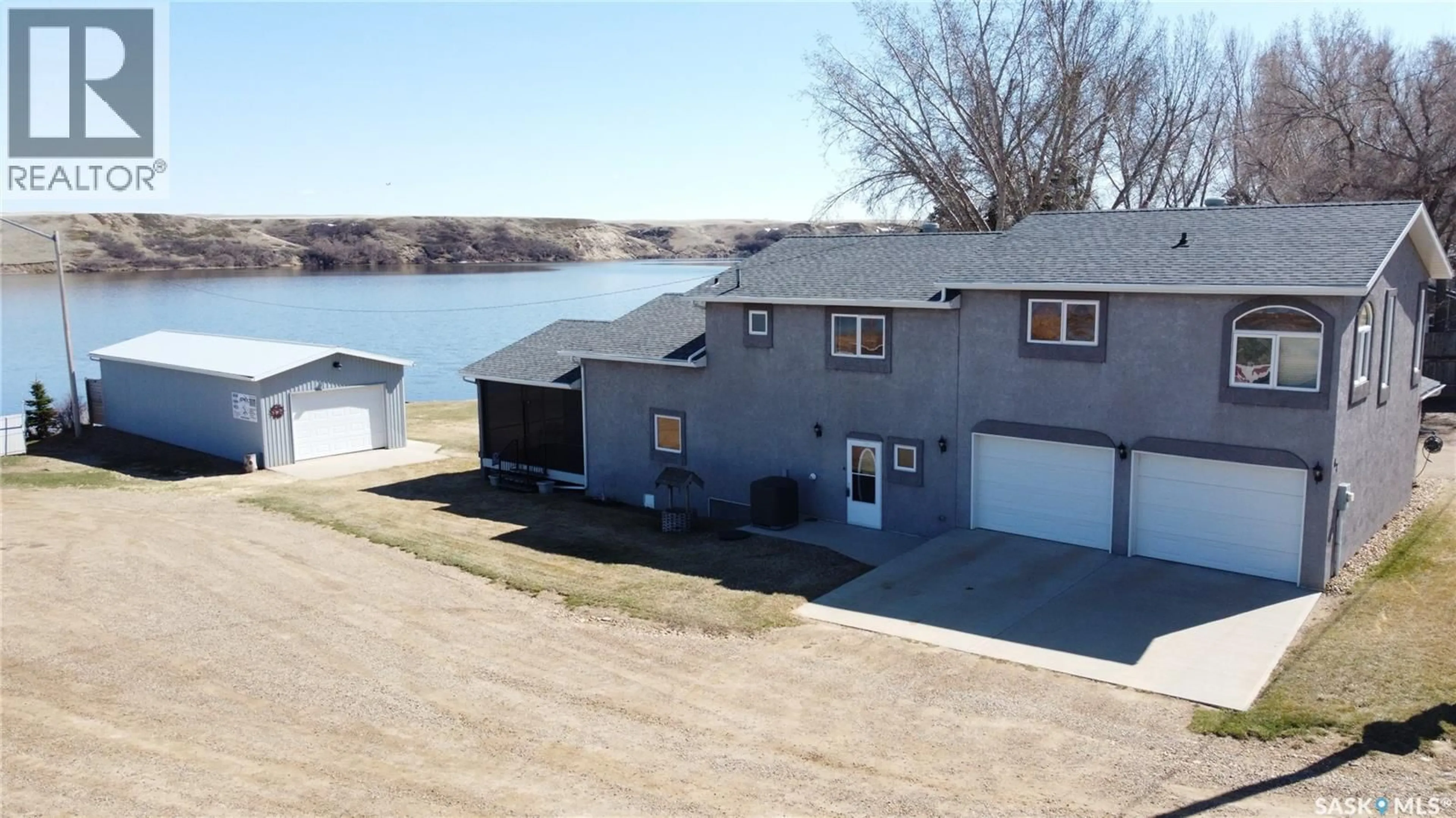 A pic from outside/outdoor area/front of a property/back of a property/a pic from drone, water/lake/river/ocean view for 47 FERGUSON BAY, Webb Rm No. 138 Saskatchewan S0N2N0