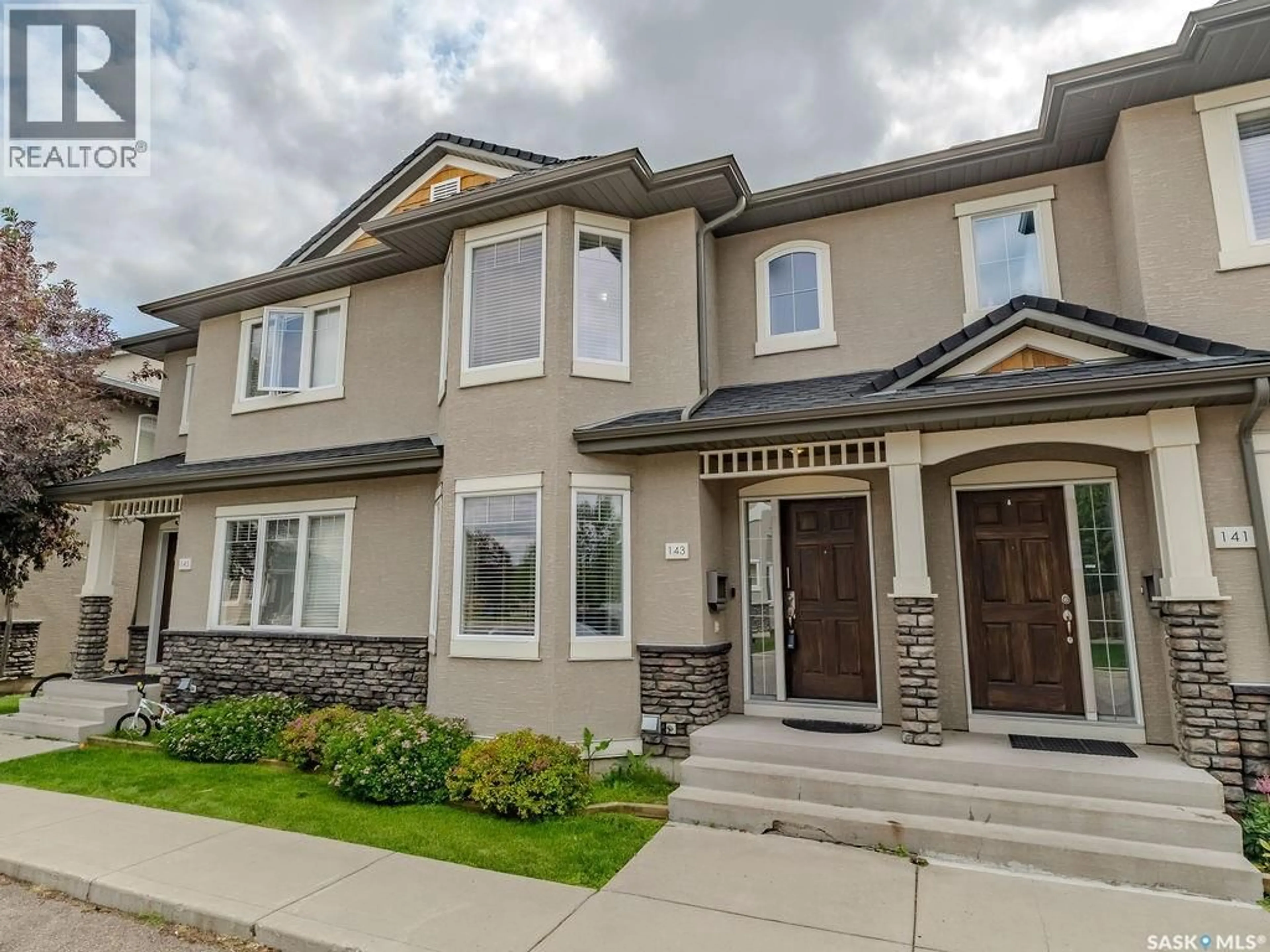 Home with vinyl exterior material, street for 143 135 ASHWORTH CRESCENT, Saskatoon Saskatchewan S7T0N1