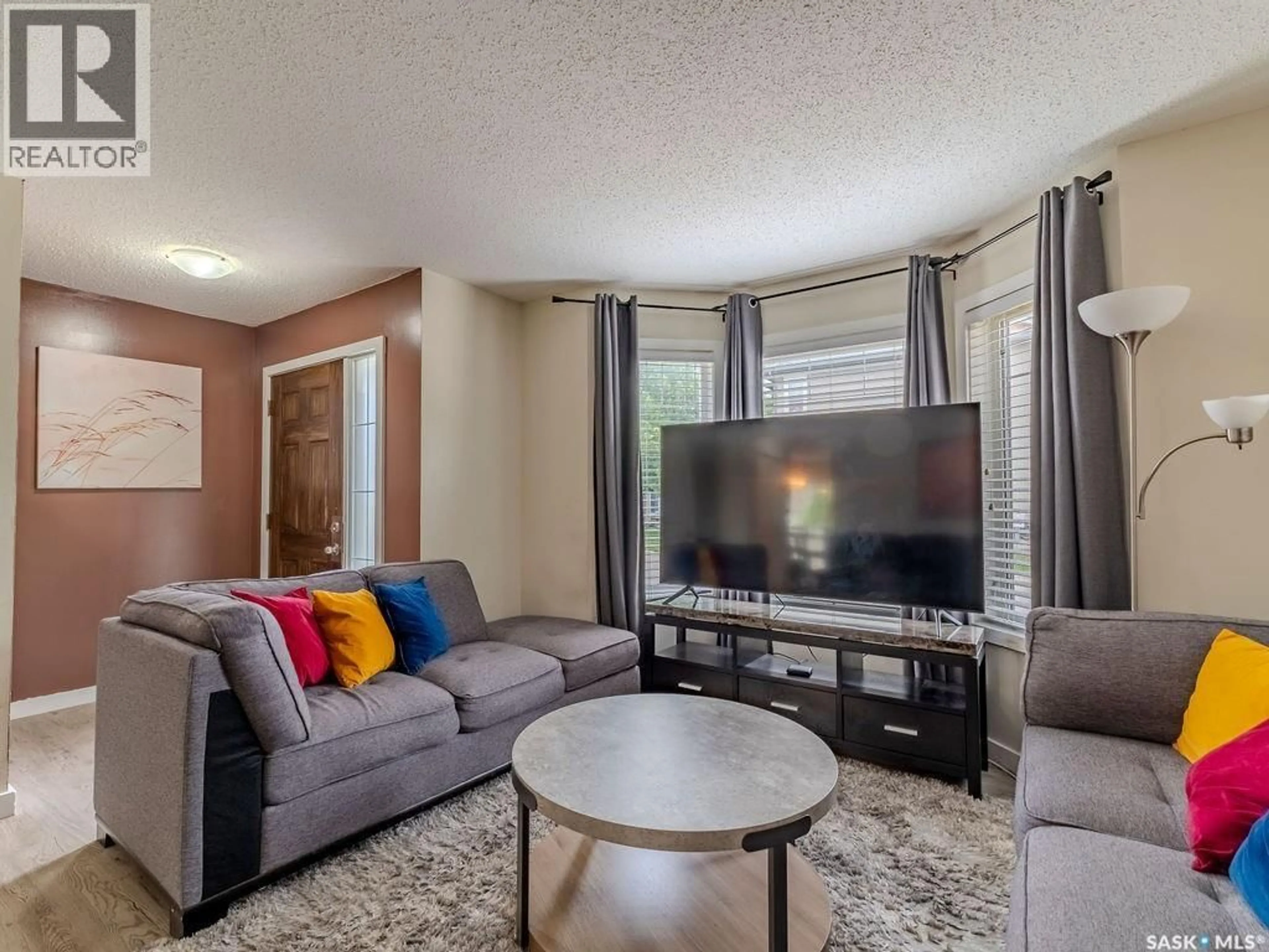 Living room with furniture, unknown for 143 135 ASHWORTH CRESCENT, Saskatoon Saskatchewan S7T0N1