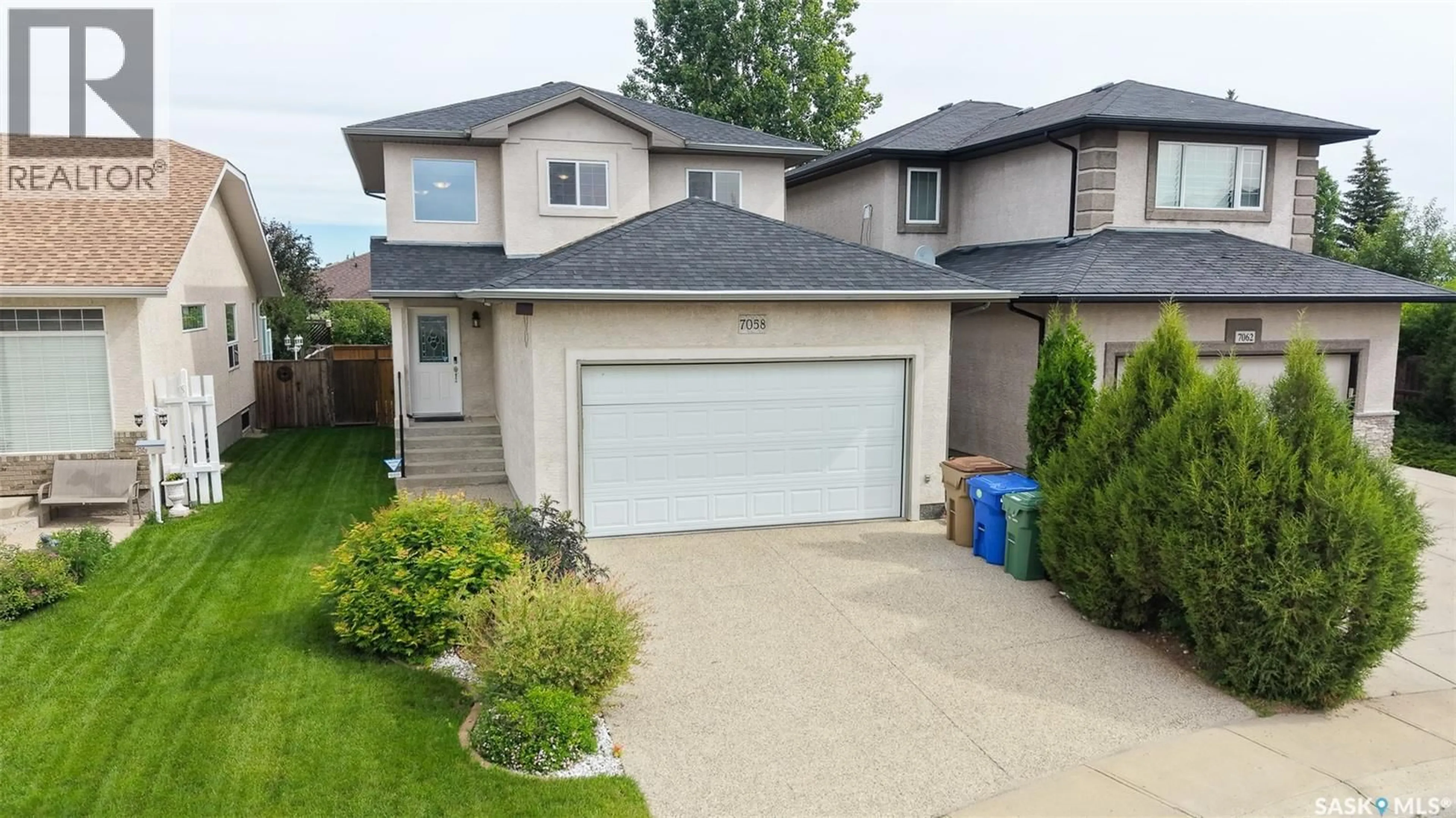 A pic from outside/outdoor area/front of a property/back of a property/a pic from drone, street for 7058 WASCANA COVE DRIVE, Regina Saskatchewan S4V3E9